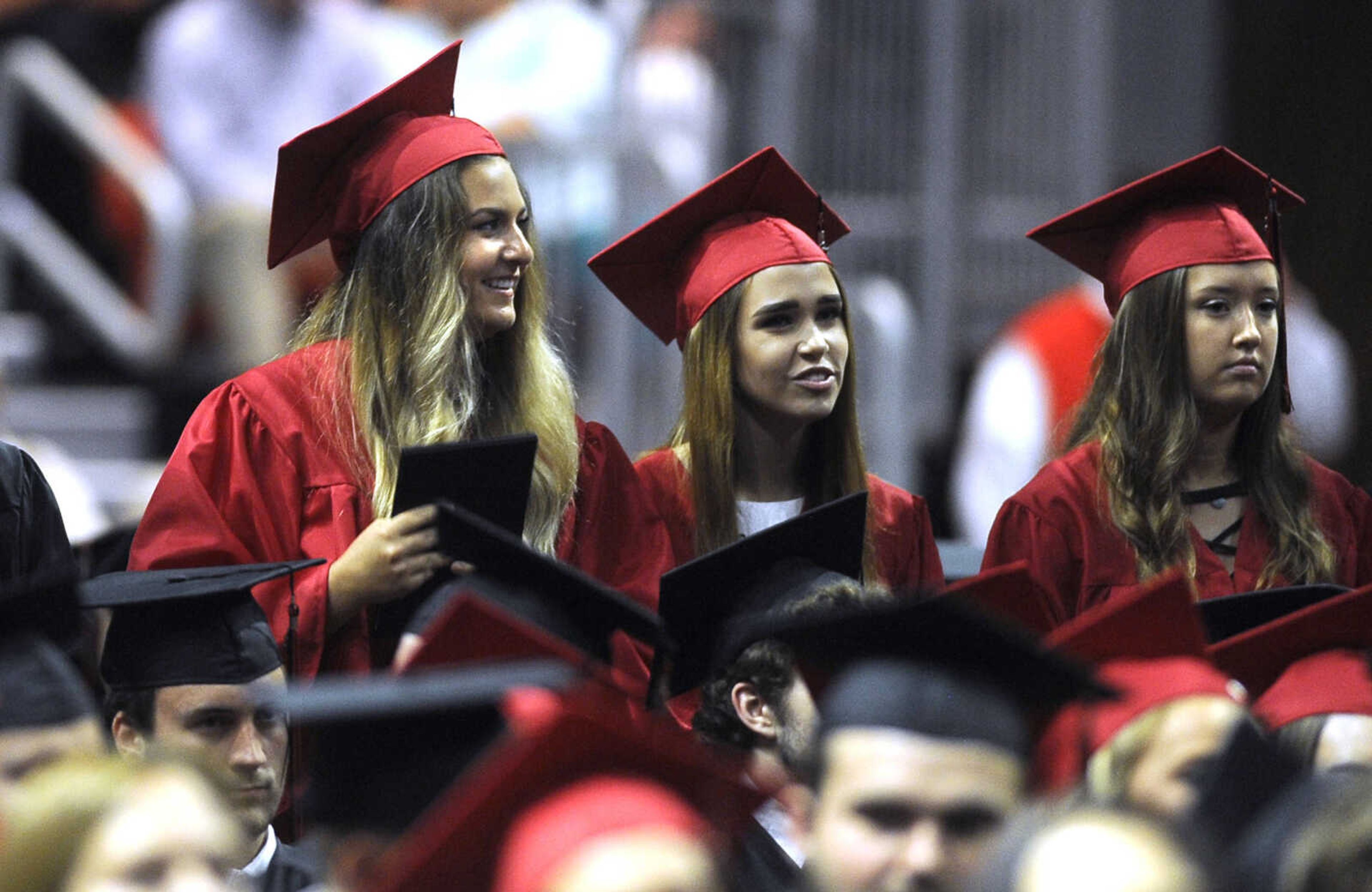 FRED LYNCH ~ flynch@semissourian.com
Jackson High School graduates stand after receiving their diplomas at commencement Friday, May 18, 2018 at the Show Me Center.