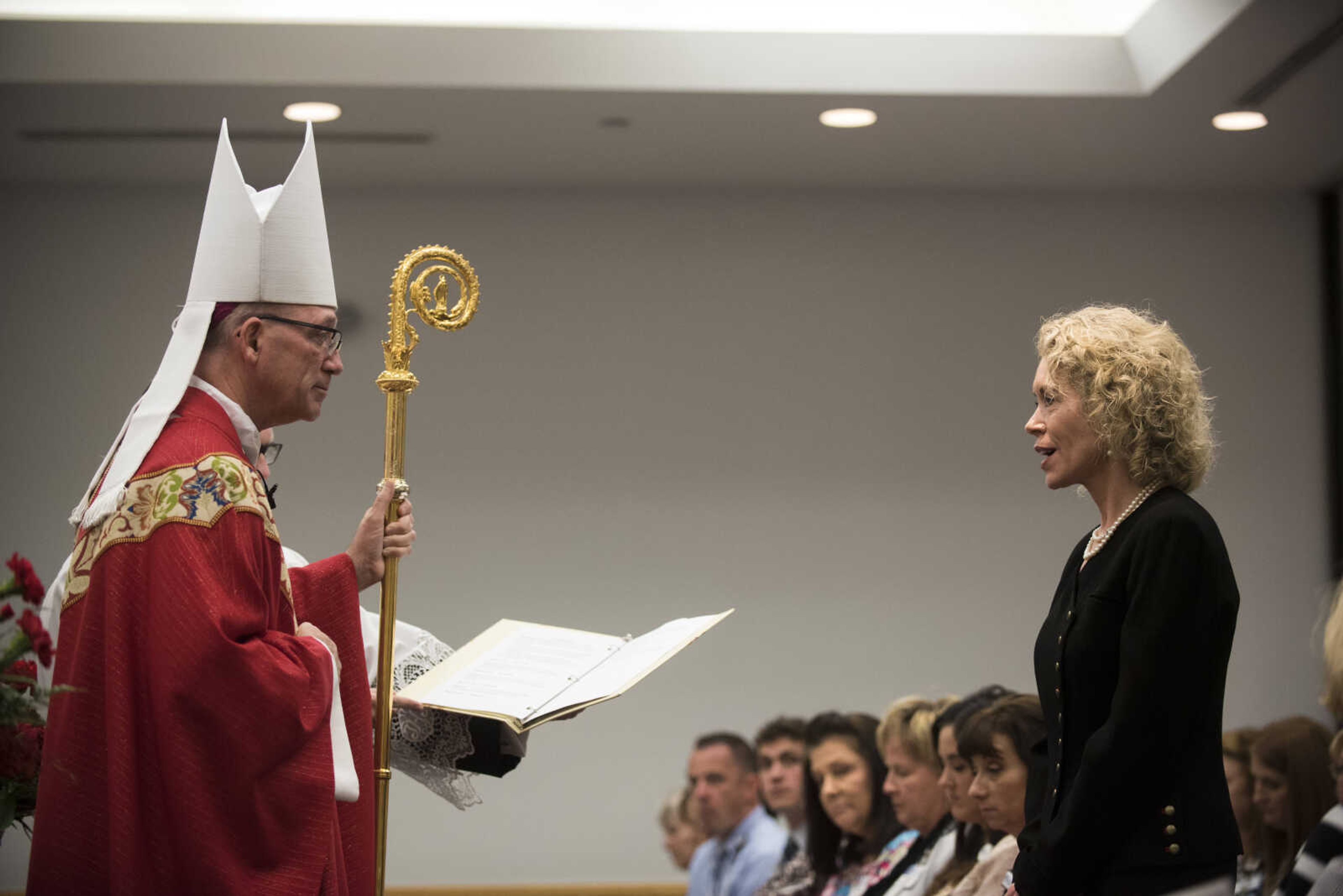 Bishop Edward M. Rice of the Diocese of Springfield-Cape Girardeau leads Maryann Reese in the Rite of Installation during her Installation Mass Sept. 20, 2017, at Saint Francis Medical Center in Cape Girardeau.