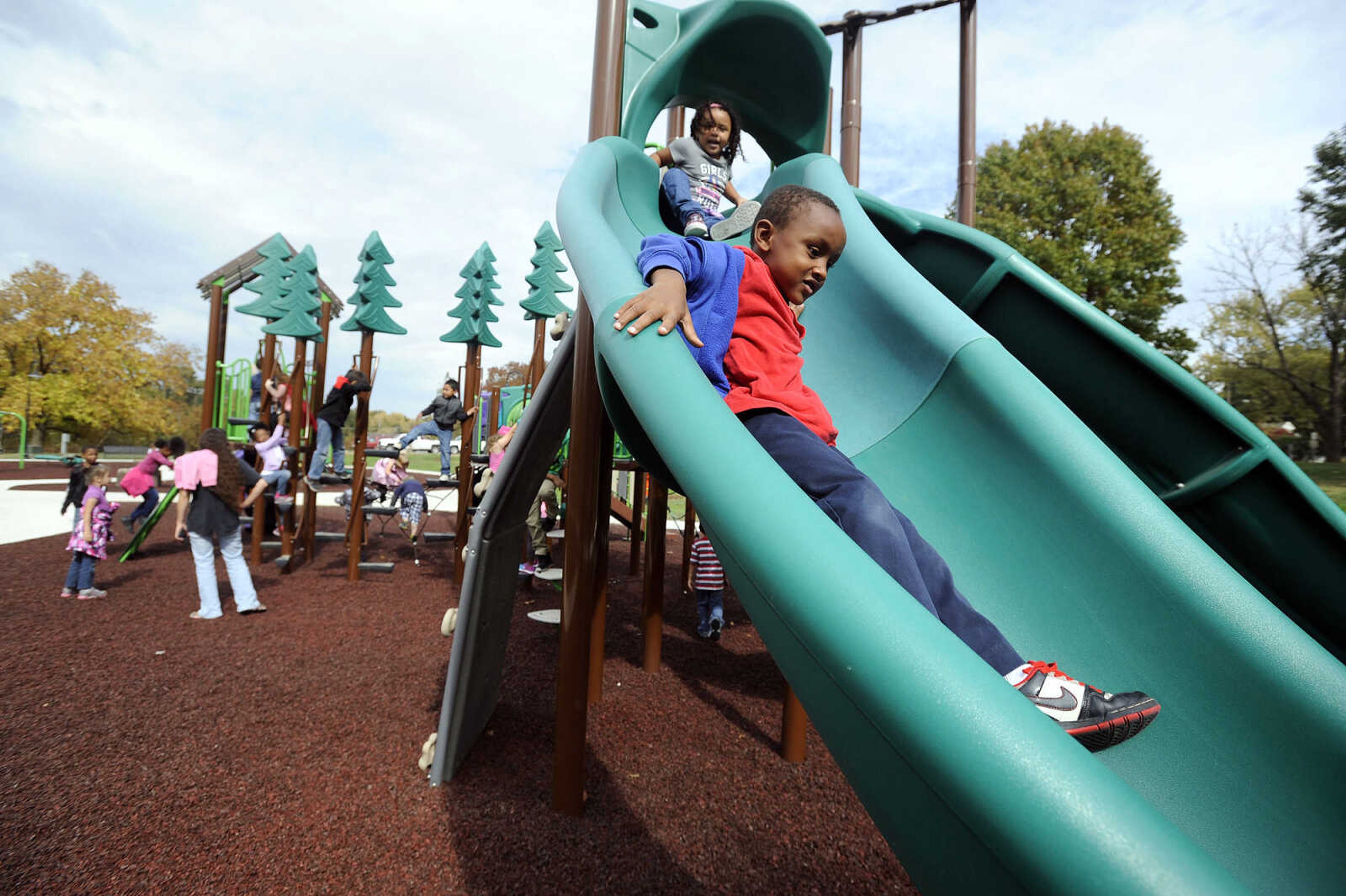 LAURA SIMON ~ lsimon@semissourian.com

Children test out the new playground at Capaha Park, Friday, Oct. 23, 2015, in Cape Girardeau.