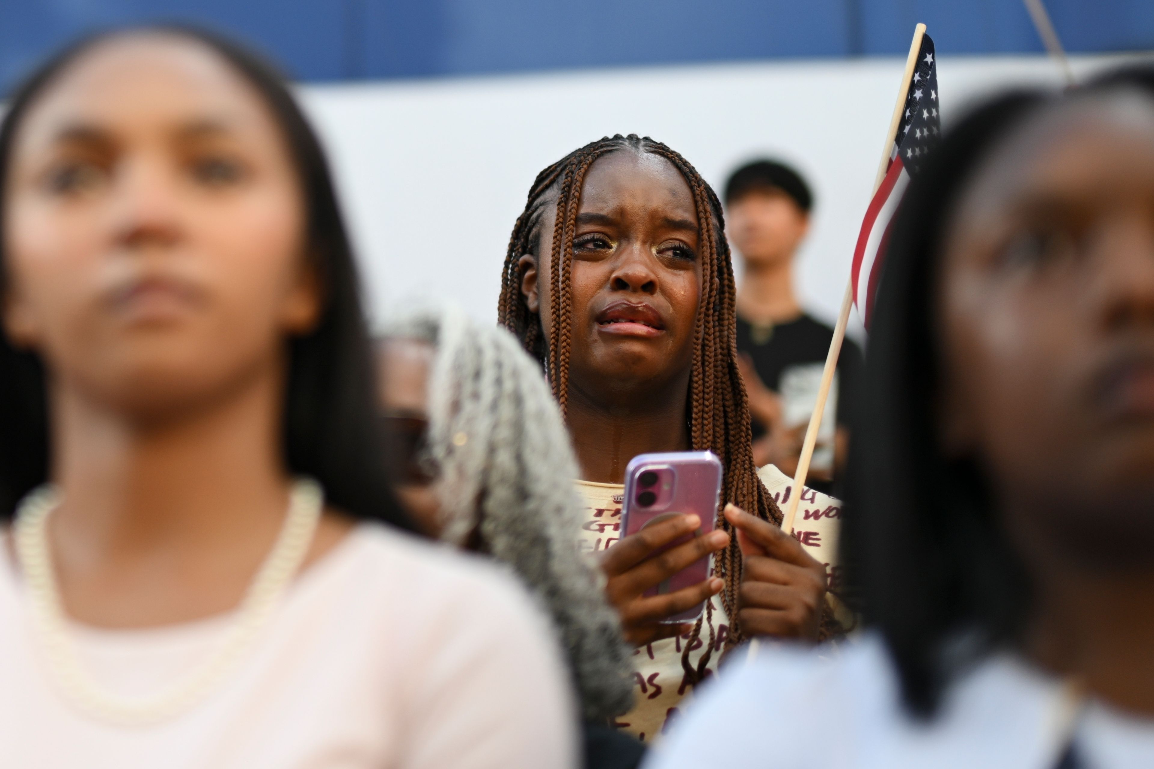 A supporter of Vice President Kamala Harris reacts as she delivers a concession speech for the 2024 presidential election on the campus of Howard University, Wednesday, Nov. 6, 2024, in Washington. (AP Photo/Terrance Williams)