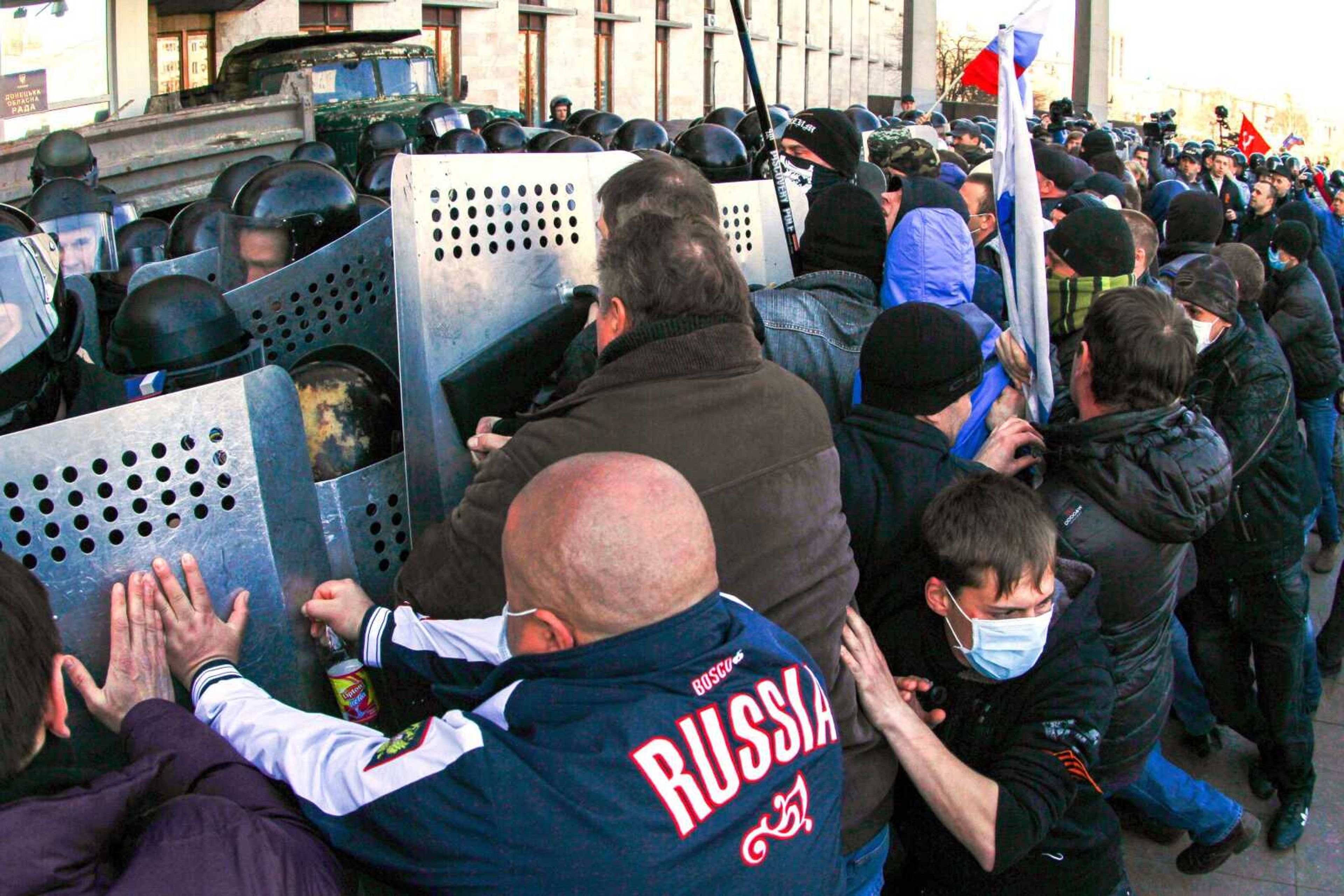 Pro-Russian activists clash with police at the regional administration building Sunday in Donetsk, Ukraine. (Andrey Basevich ~ Associated Press)