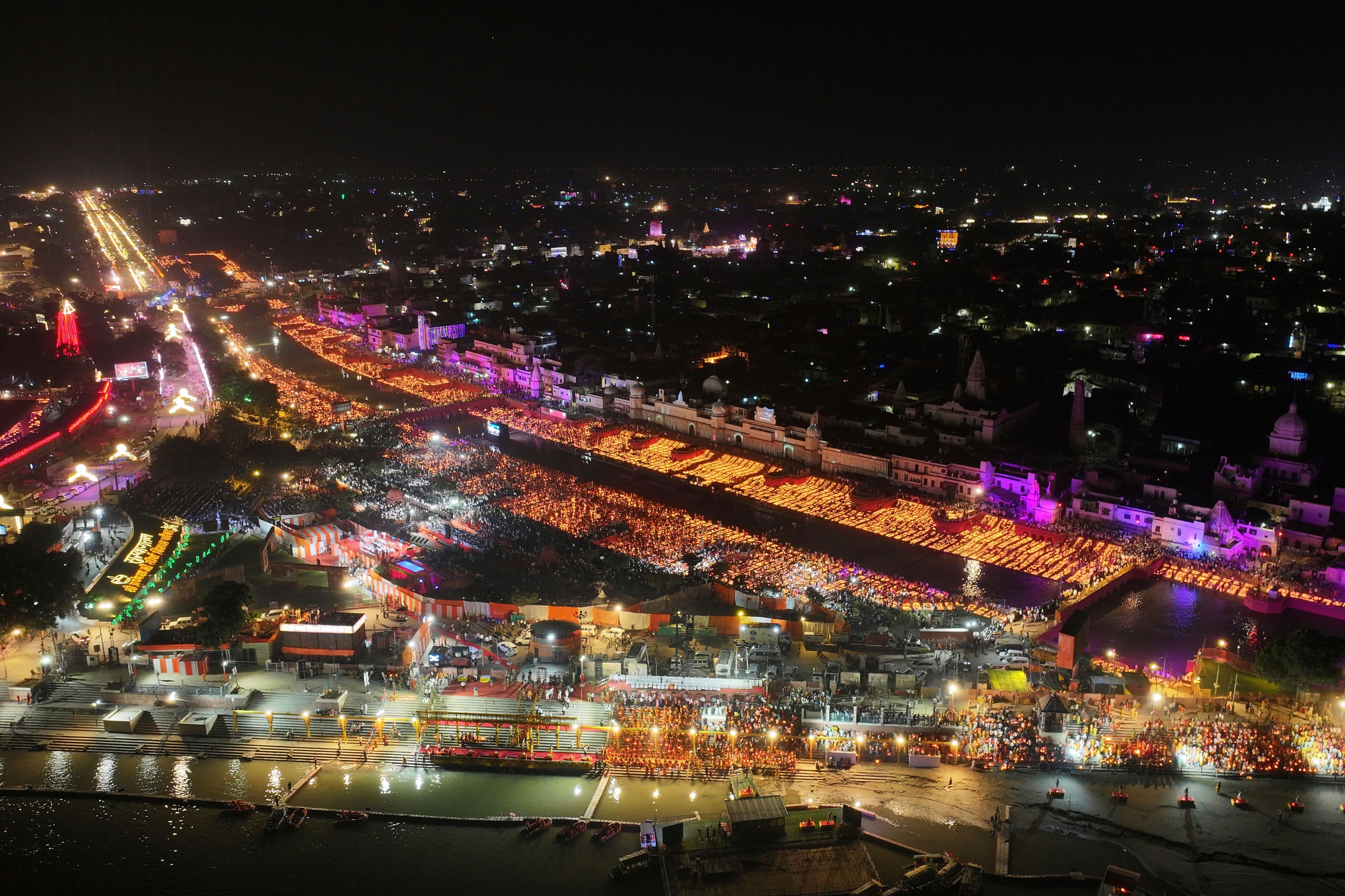 A record 2.51 million earthen oil lamps are lit along the Saryu river during Deepotsav celebrations on the eve of Diwali, creating a new Guinness World Record, in Ayodhya, India, Wednesday, Oct. 30, 2024. (AP Photo/Rajesh Kumar Singh)