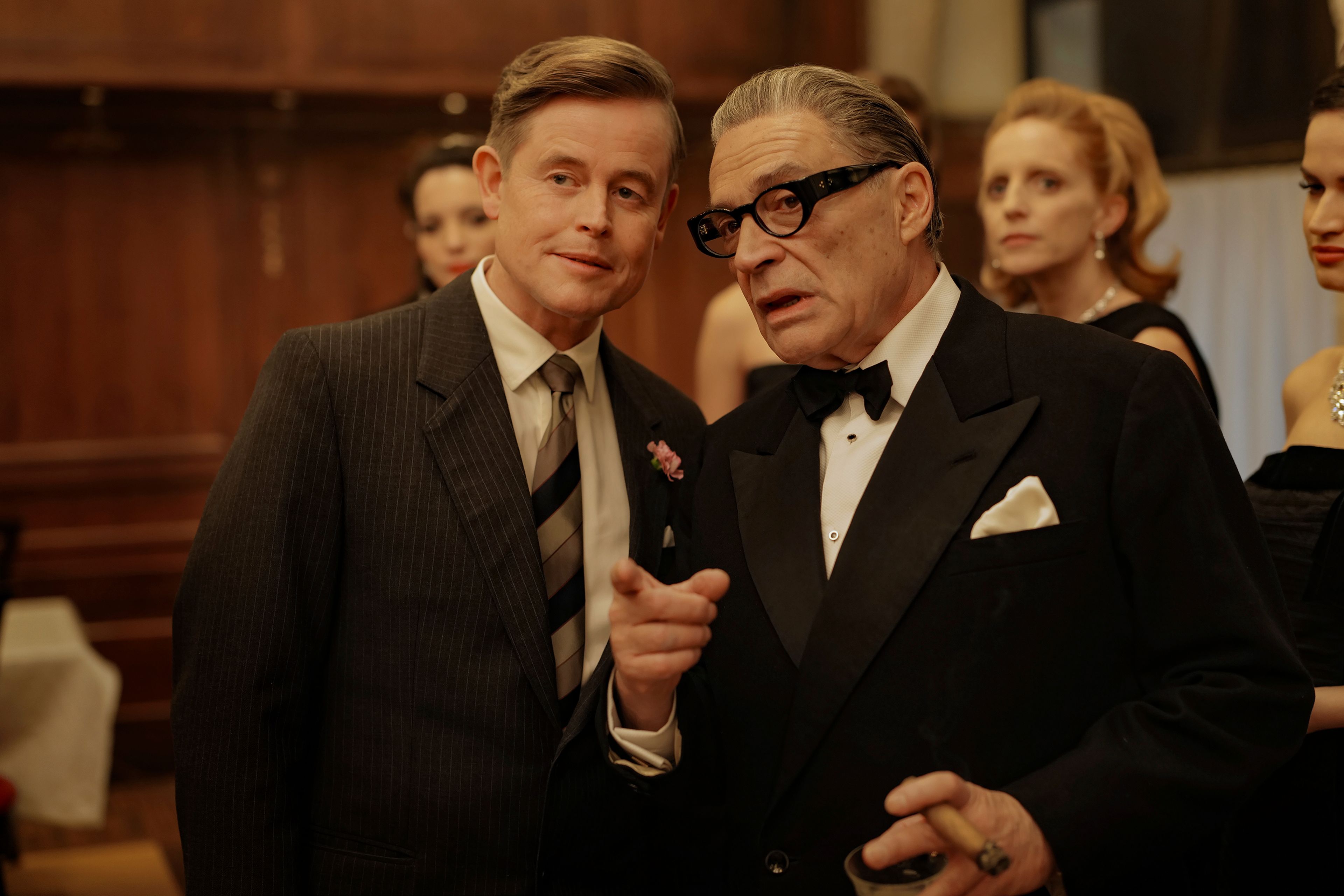 This image released by Netflix shows Caspar Phillipson, as JFK, left, and Haluk Bilginer, as Aristotle Onassis, in a scene from "Maria." (Pablo Larraín/Netflix via AP)