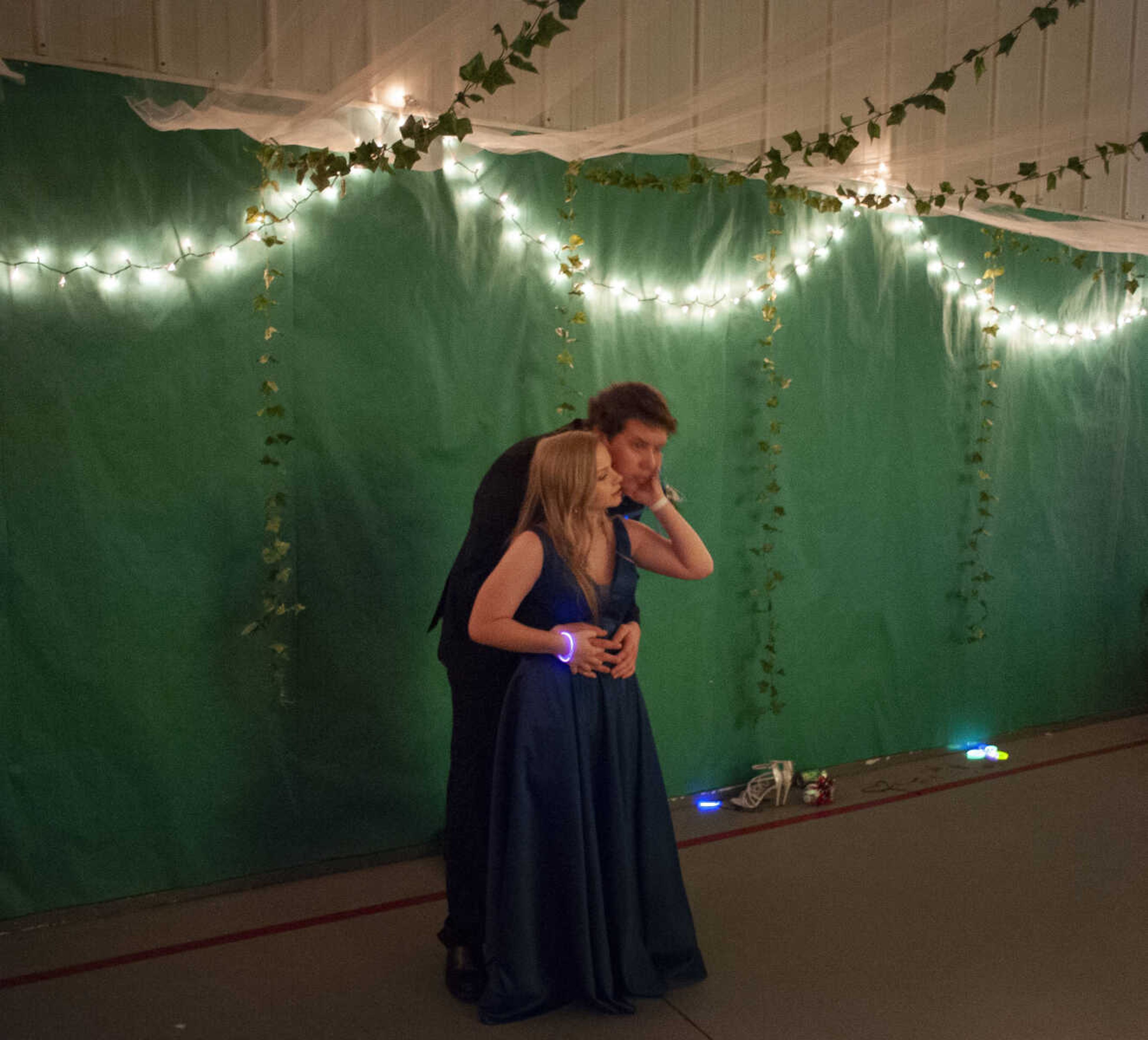 Delta junior Ryan Birkman and Zoe Lipe of Scott City stand to the side of the dance floor during Delta High School's prom on Saturday, April 13, 2019, at the Delta Community Center.