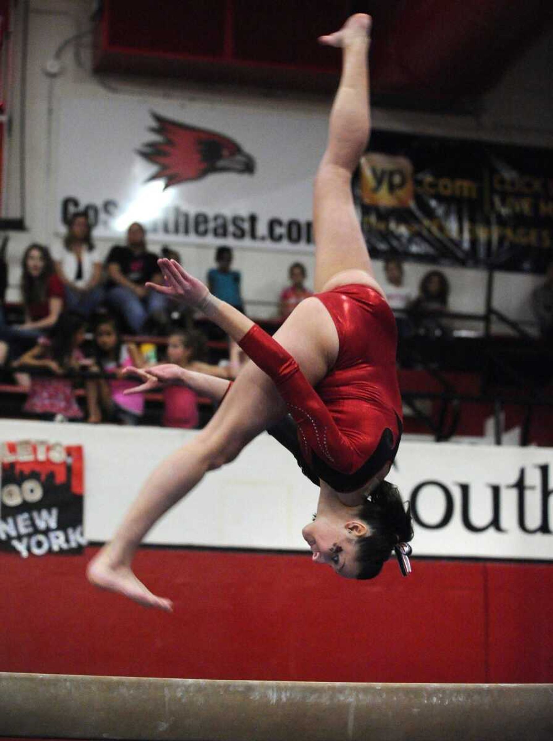 Southeast Missouri State's Taylor Huey competes on the balance beam Friday.