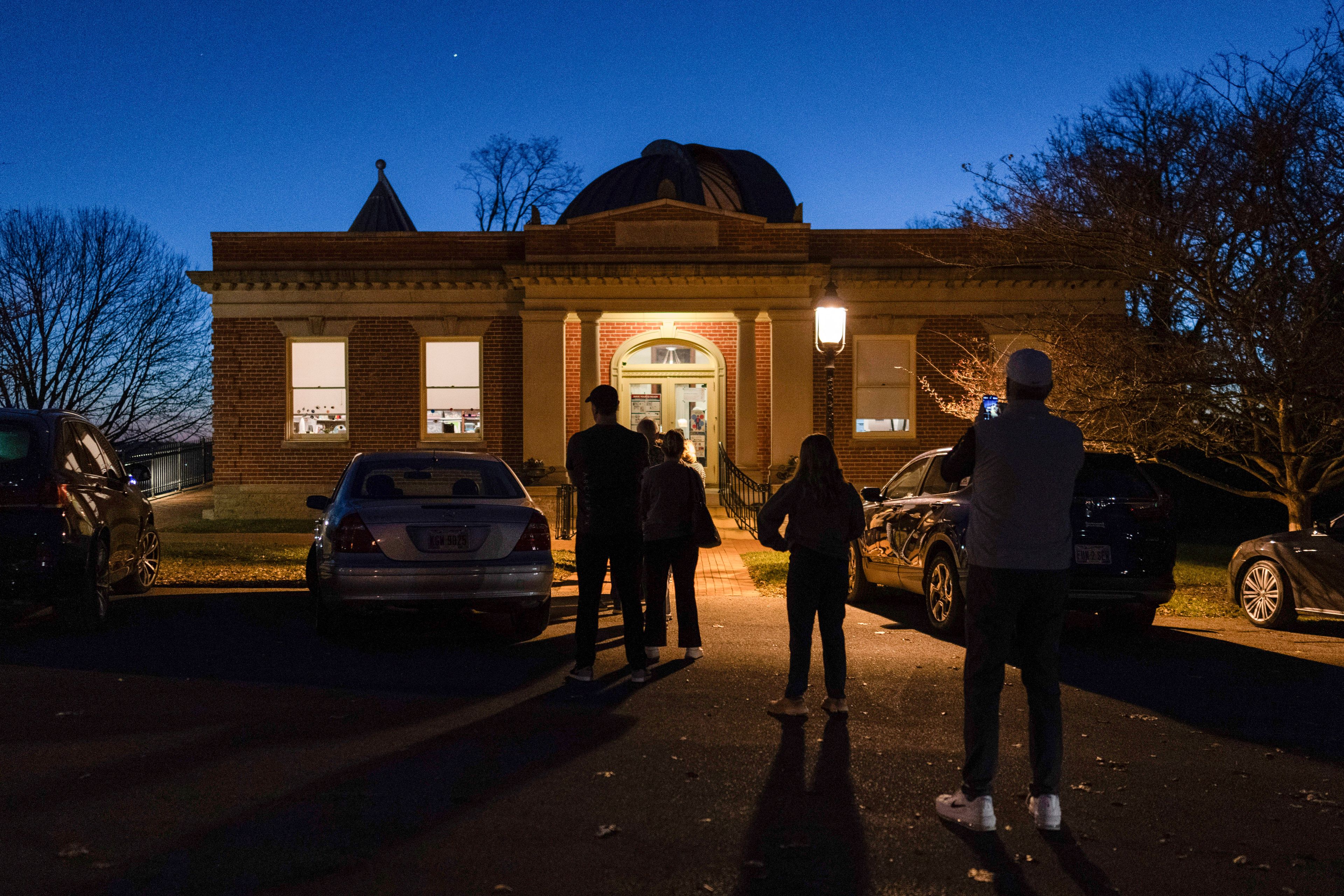 Voters line up to enter their polling place at the Cincinnati Observatory on election day, Tuesday, Nov. 5, 2024, in Cincinnati. (AP Photo/Carolyn Kaster)