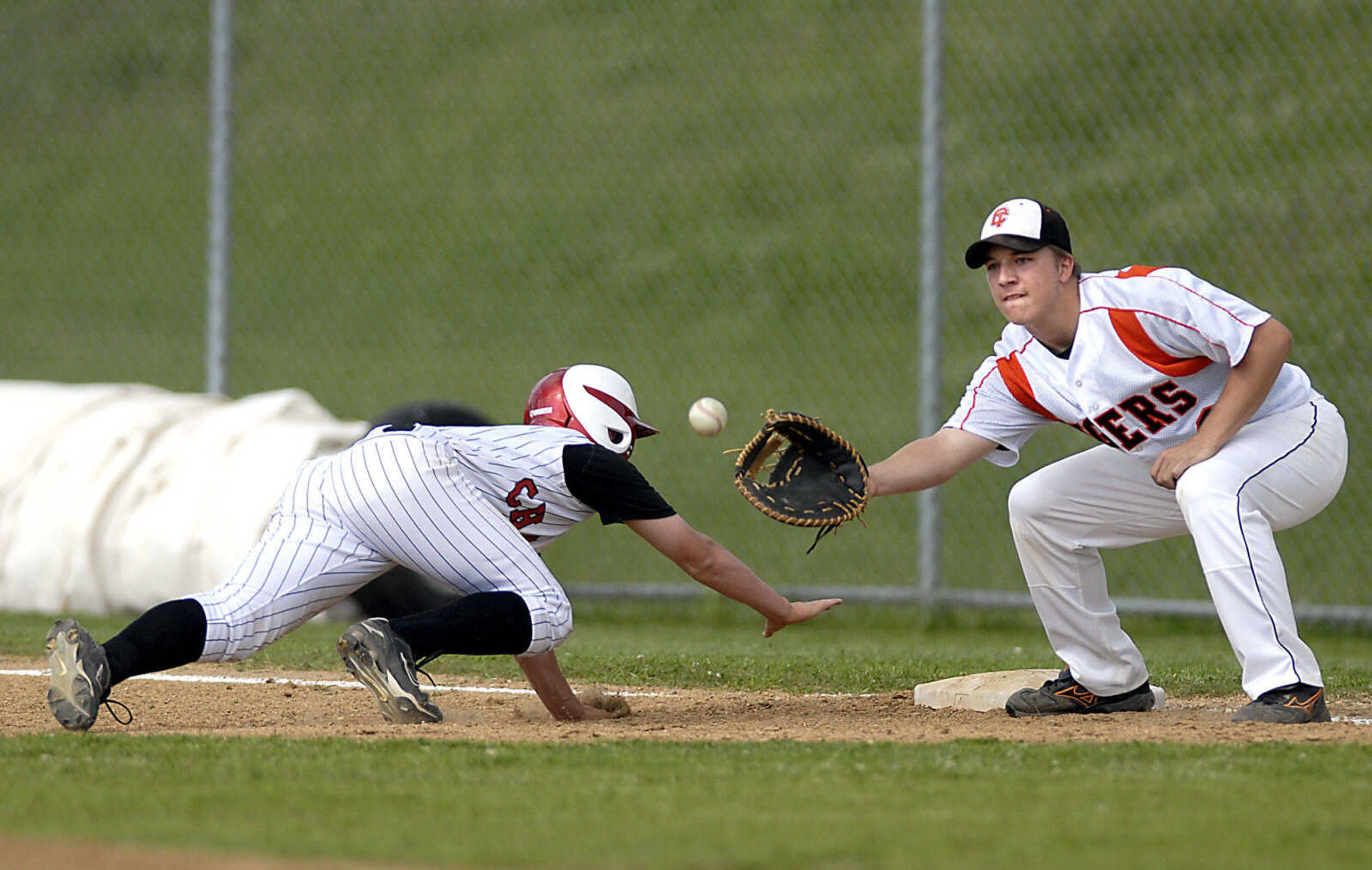 Chaffee's Alex Davie barely returns to first in time as Jamie Pickel catches the pickoff throw Monday, May 11, 2009, at Central High in Cape Girardeau.