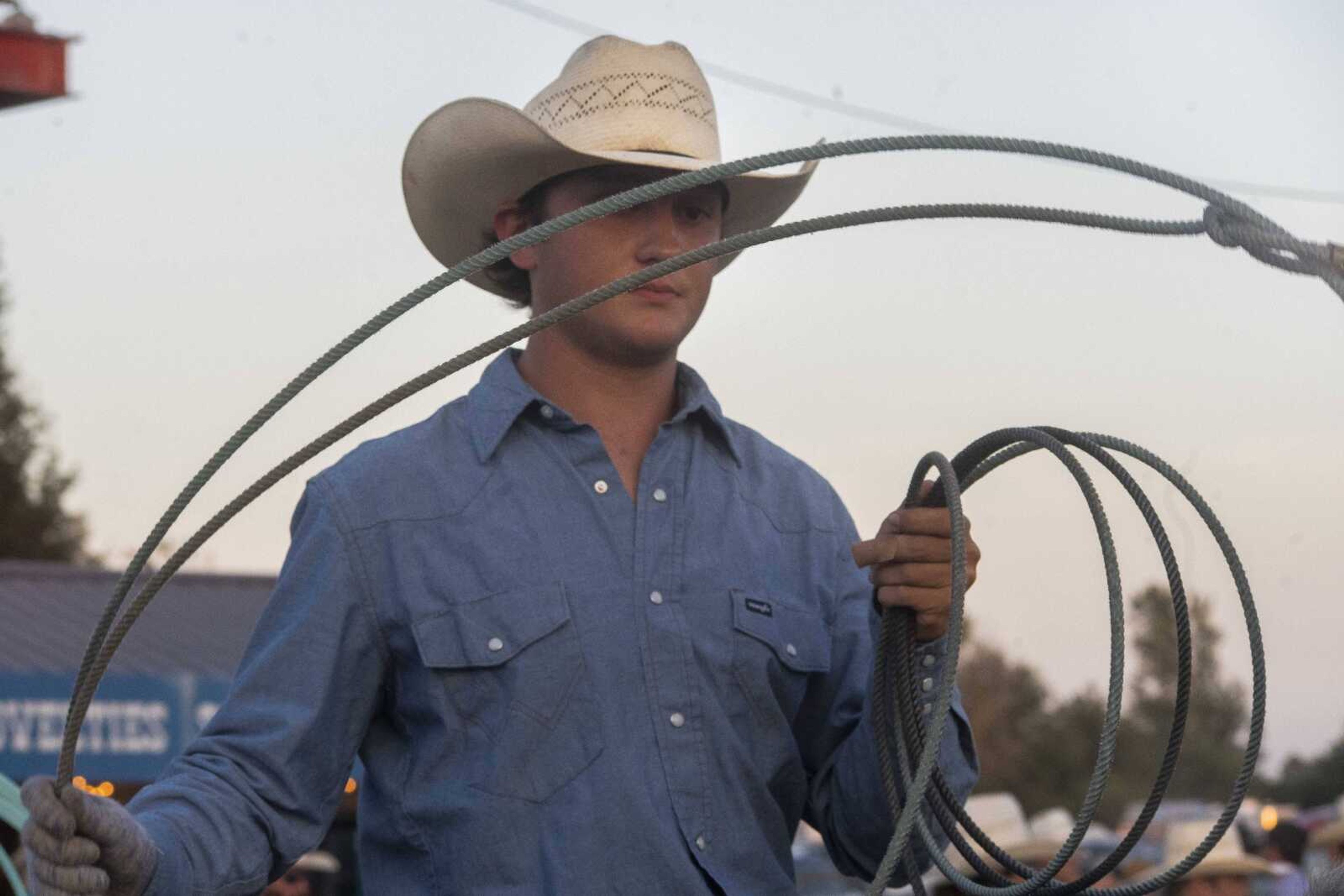 Luke Fenton prepares for an event during the first night of the Sikeston Jaycee Bootheel Rodeo on Wednesday, Aug. 11, 2021, in Sikeston, Missouri.