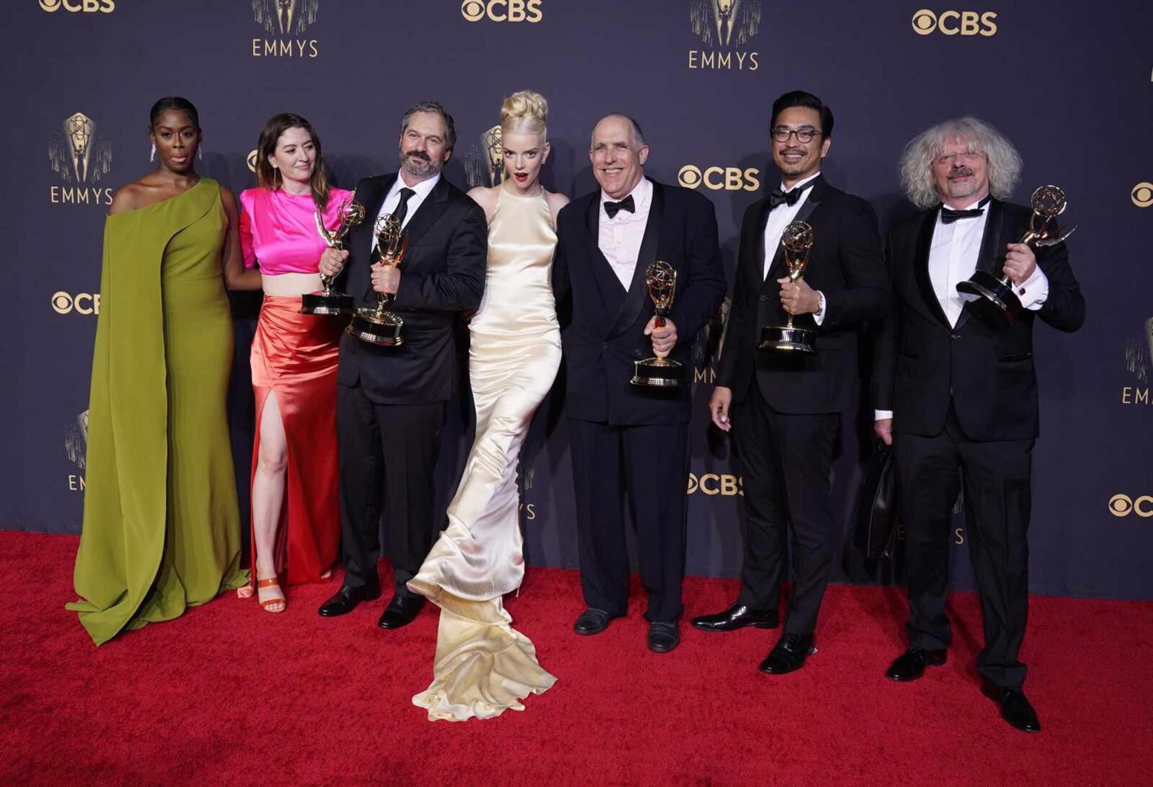 From left, Moses Ingram, Marielle Heller, Scott Frank, Anya Taylor-Joy, William Horberg, Mick Aniceto and Marcus Loges, winners of the award for outstanding directing for a limited or anthology series or movie for "The Queen's Gambit", pose at the 73rd Primetime Emmy Awards on Sunday at L.A. Live in Los Angeles.