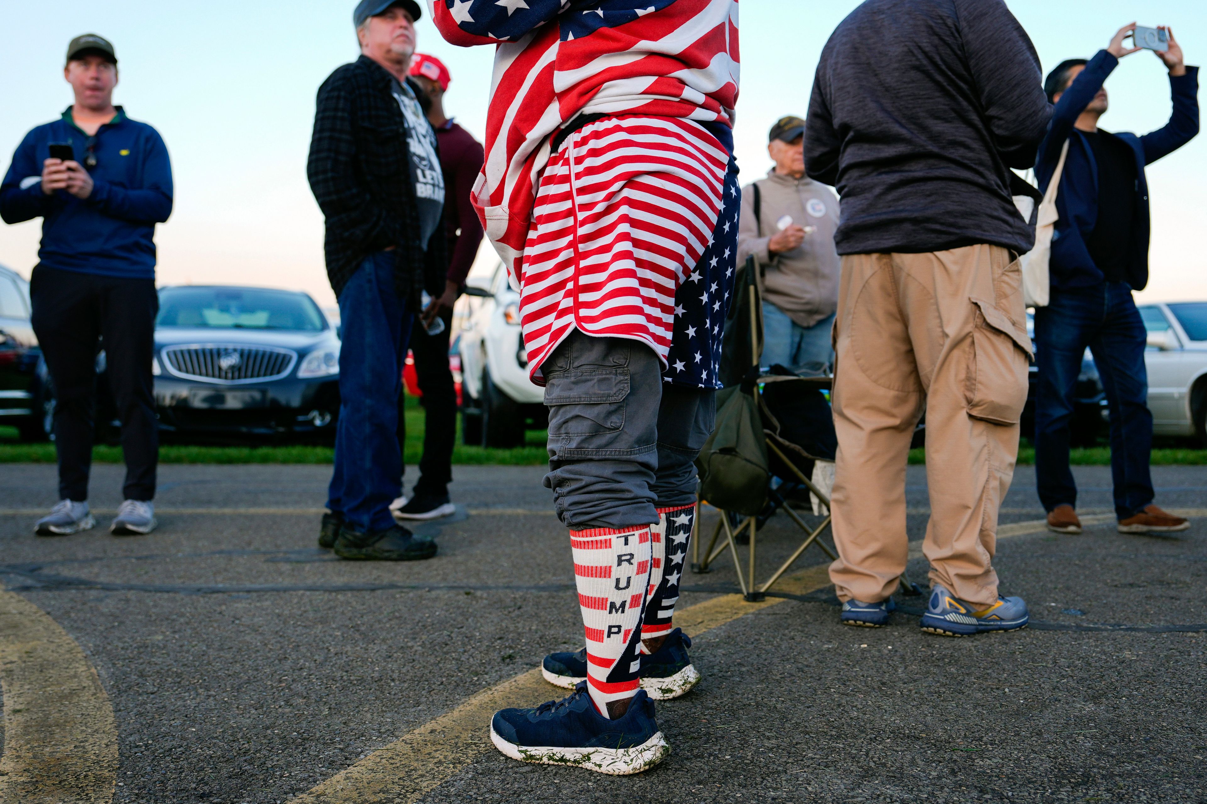 Supporters of Republican presidential nominee former President Donald Trump wait to enter a campaign rally at the Butler Farm Show, Saturday, Oct. 5, 2024, in Butler, Pa. (AP Photo/Julia Demaree Nikhinson)