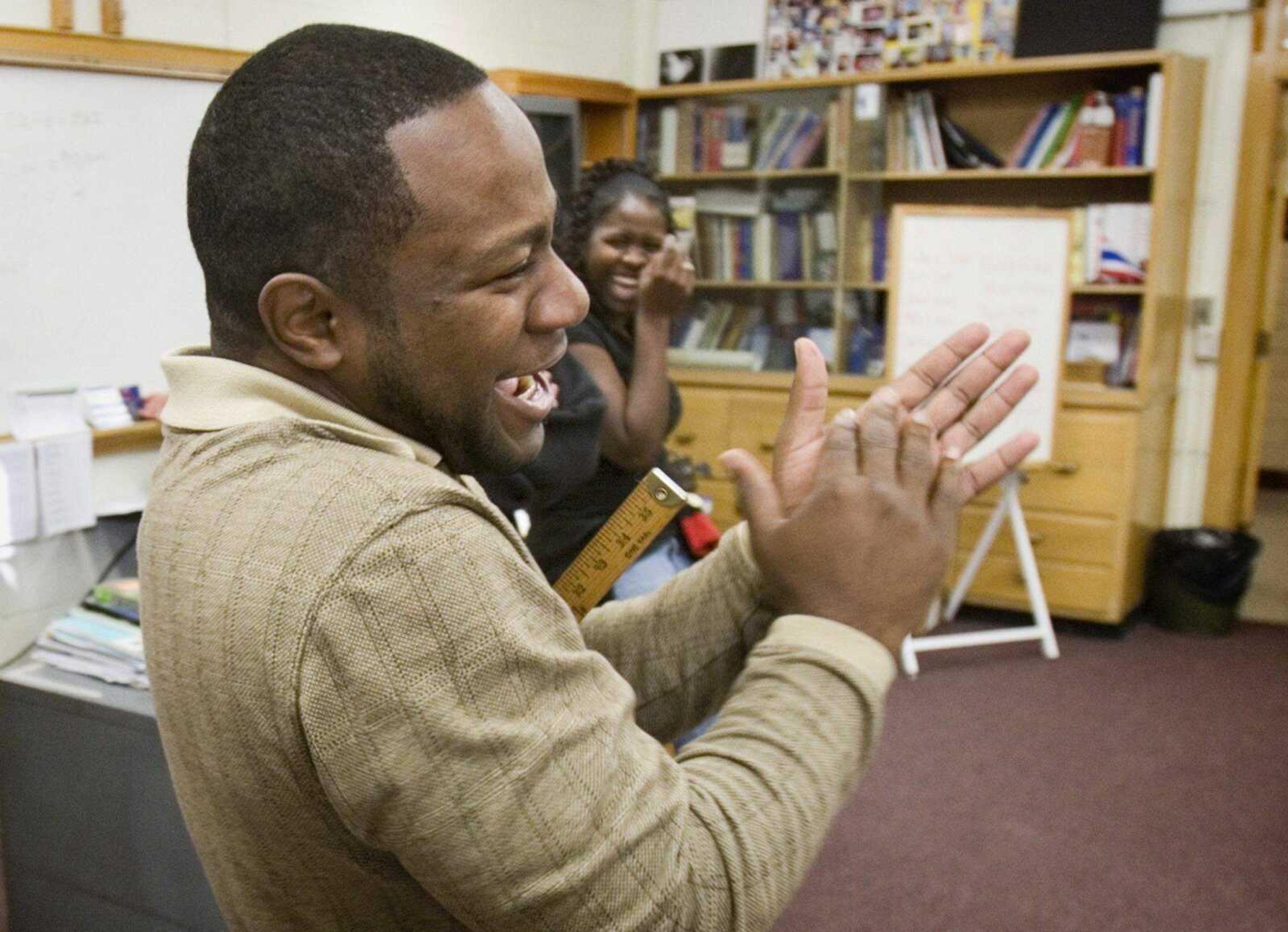 Marquis Murphy, head of Youth Educational Empowerment Program, taught a high school class about financial literacy Nov. 20 in Wichita, Kan. (Mike Hutmacher ~ The Wichita Eagle)