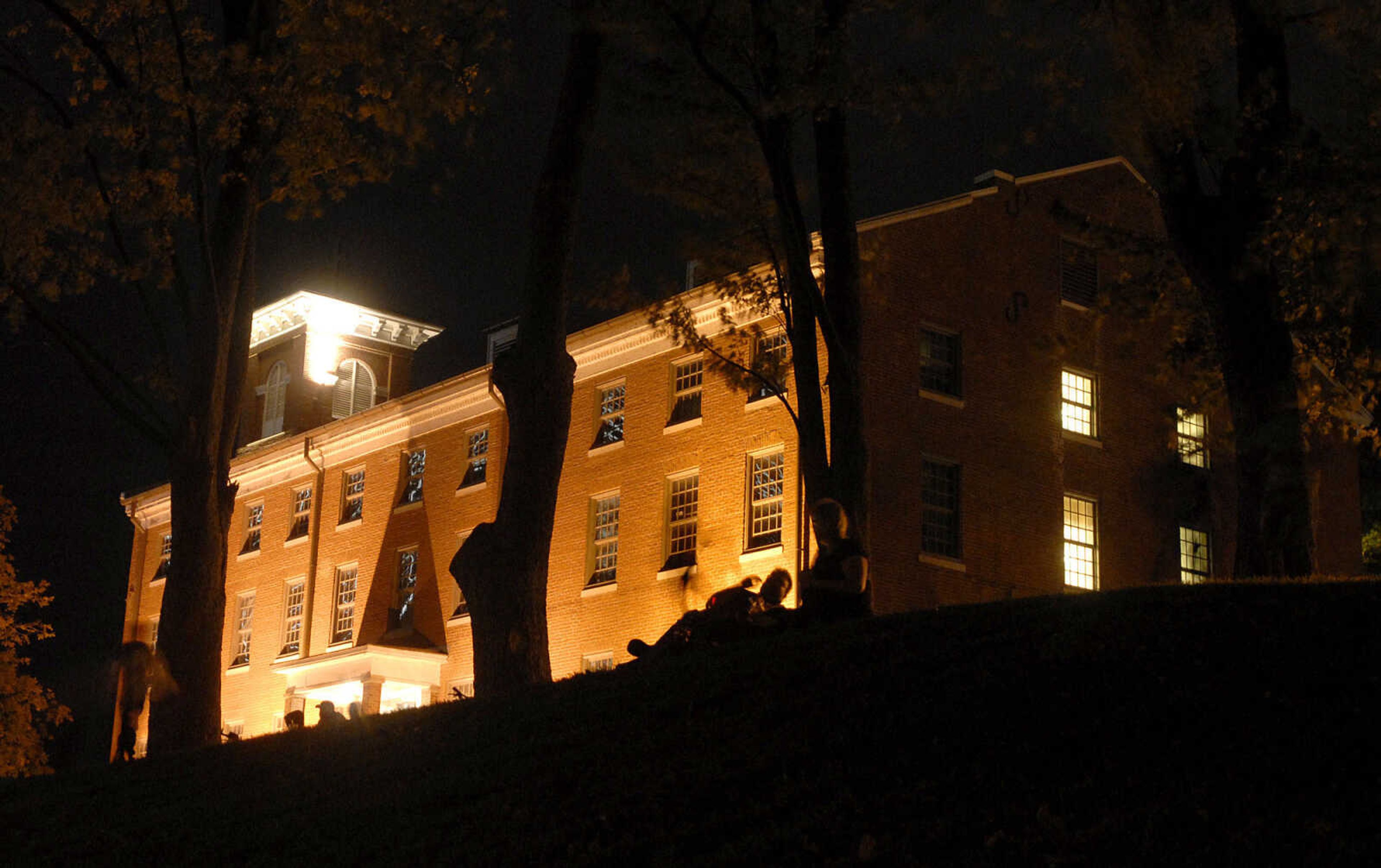 LAURA SIMON ~ lsimon@semissourian.com
The old seminary building sets atop the hill as story tellers Regina Carpenter and Gayle Ross tell bone chilling tales Friday, October 14, 2011 during an evening of Ghost Storytelling at the east lawn of the River Campus of Southeast Missouri State University in Cape Girardeau.