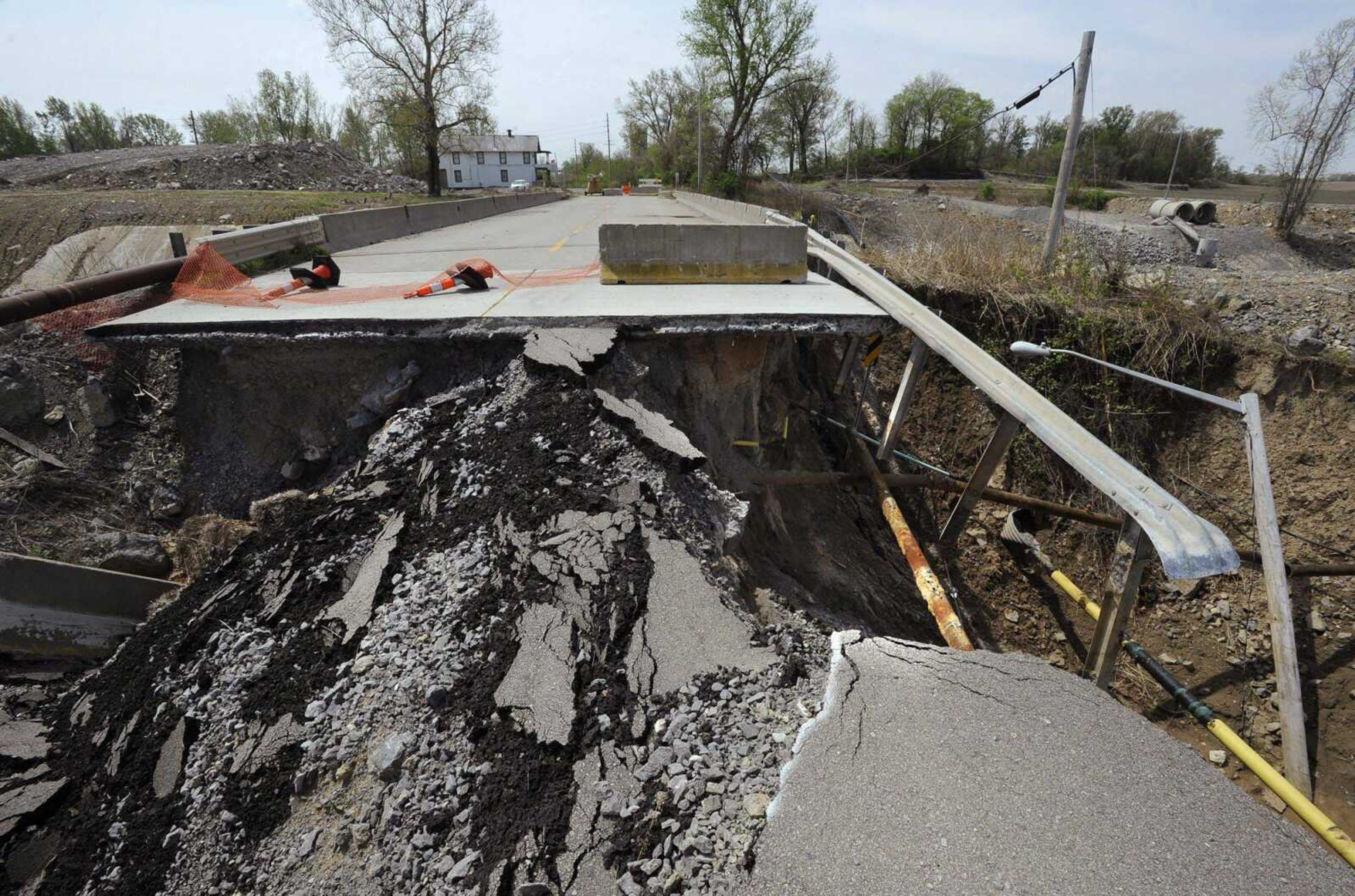 South Sprigg Street in Cape Girardeau remains impassible Thursday because of the large sinkhole that collapsed the street. (Fred Lynch)