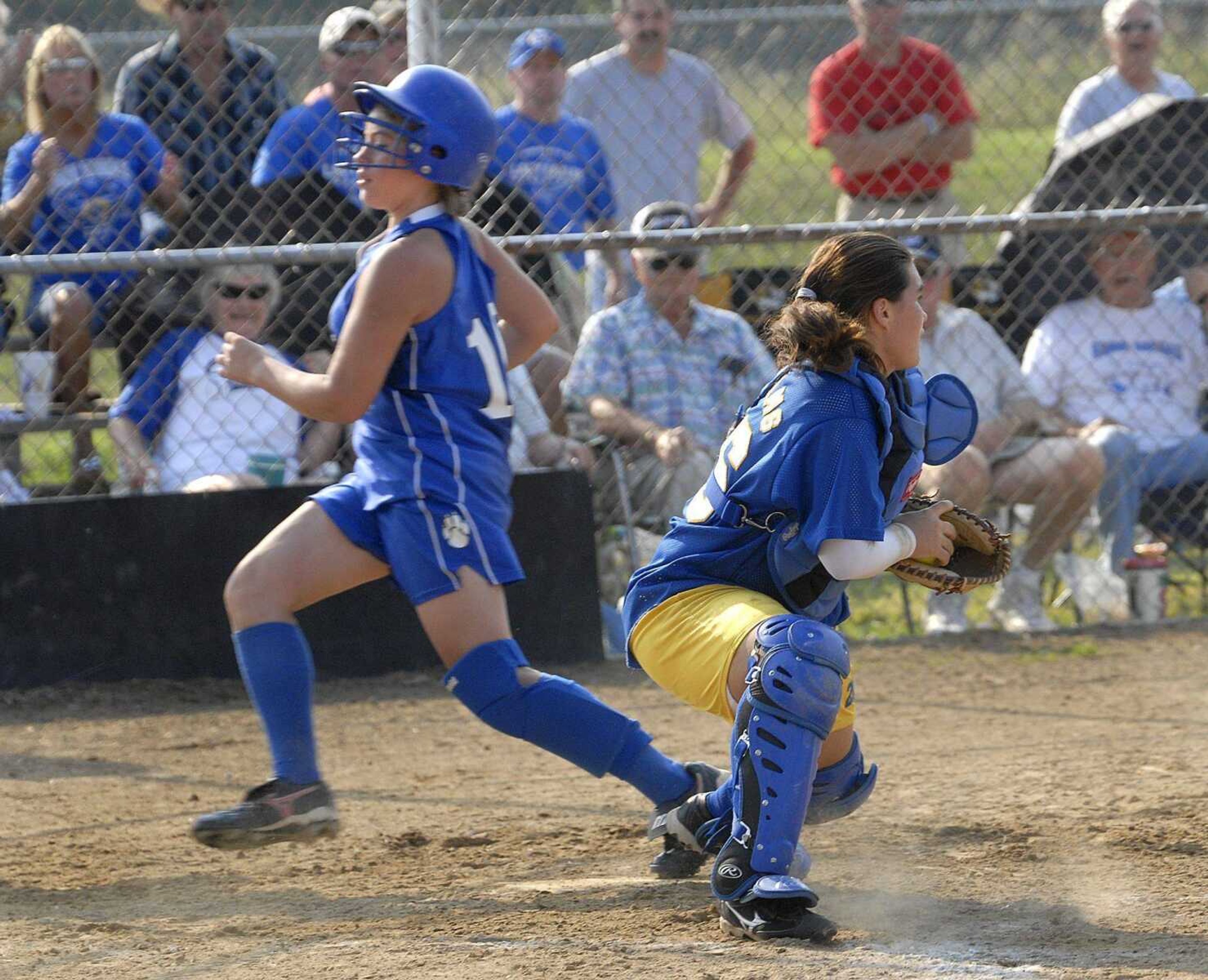 FRED LYNCH ~ flynch@semissourian.com
Delta's Rachel Bartels scores during the seventh inning past Oran catcher Amanda Williams in their Class 1 District 1 title game Saturday at Delta.