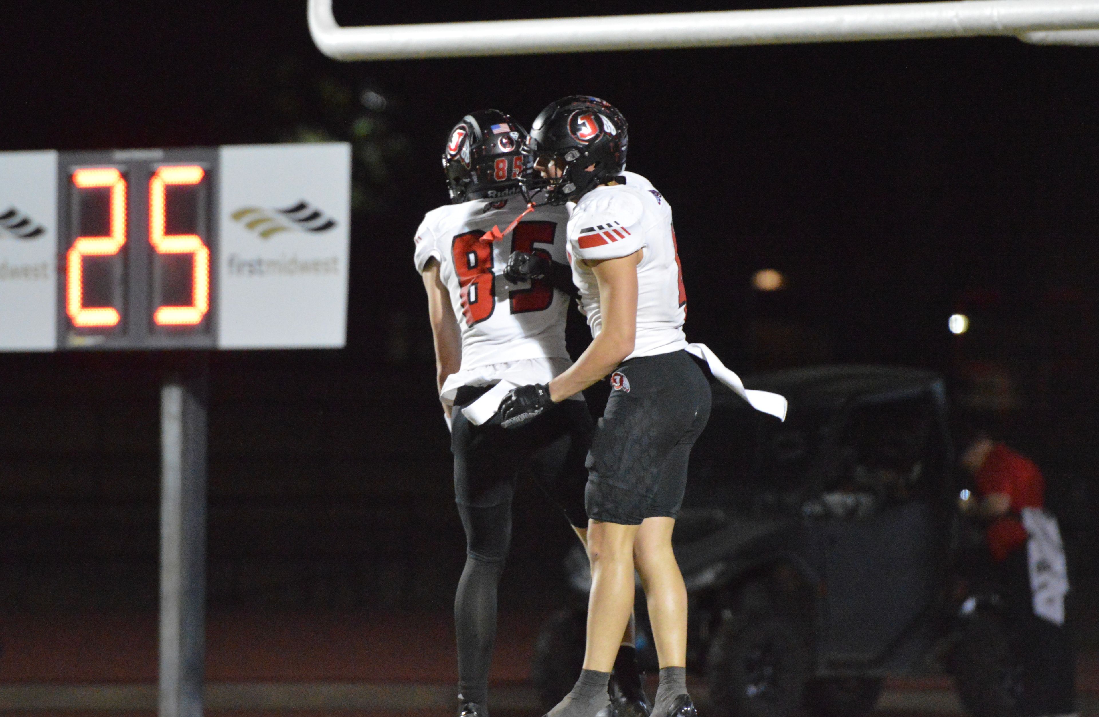 Jackson wide receiver Kamden Brockmire, left, celebrates with teammate Kai Crowe, right, after a 62-yard touchdown catch against Sikeston on Friday, Oct. 11. The Indians defeated the home Bulldogs 55-12 to improve to 5-2 on the season.