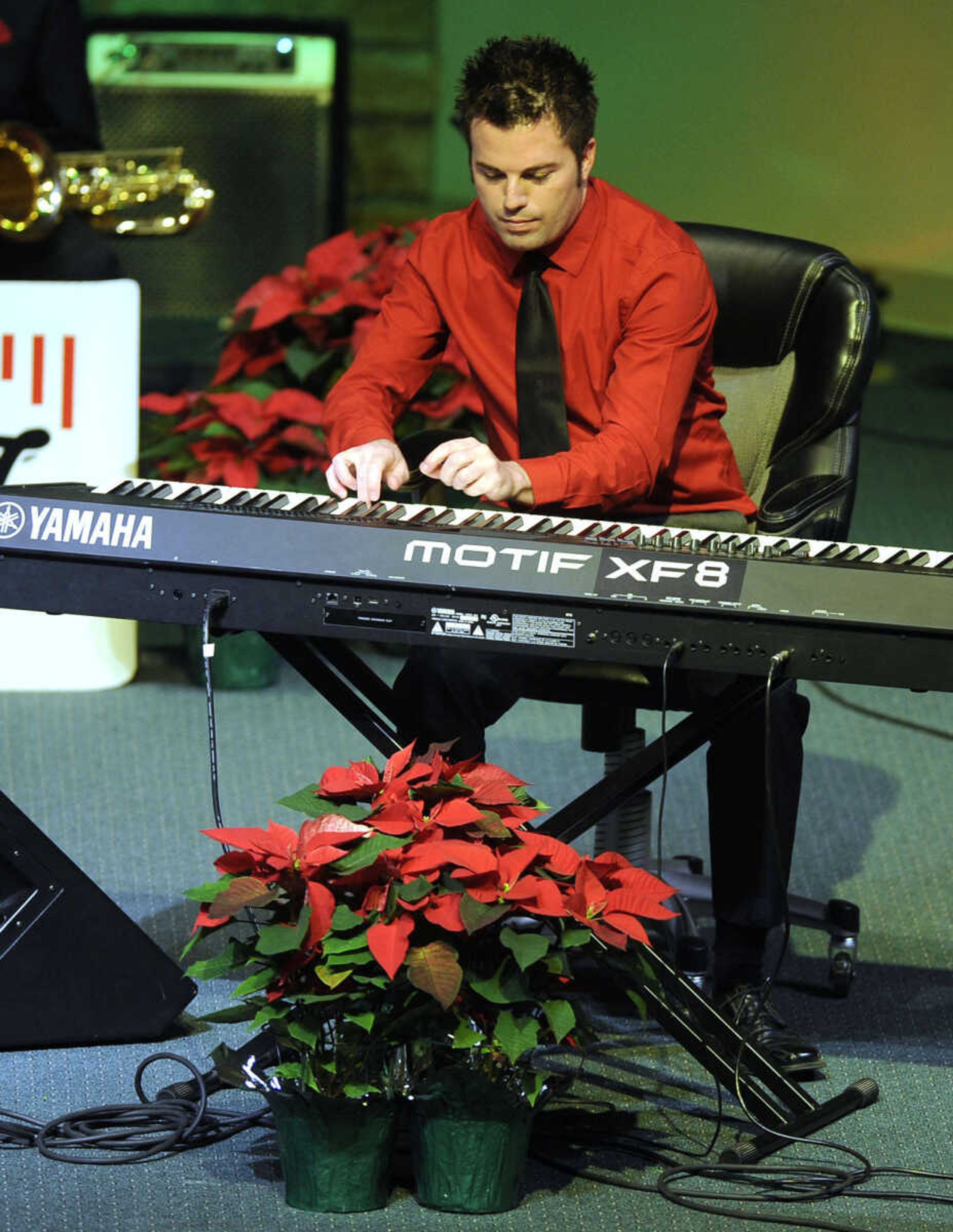 Shane Steck performs "Hark, The Herald Angels Sing" at the 19th annual Sounds of the Season Christmas concert Sunday, Dec. 7, 2014 at Cape Bible Chapel in Cape Girardeau.