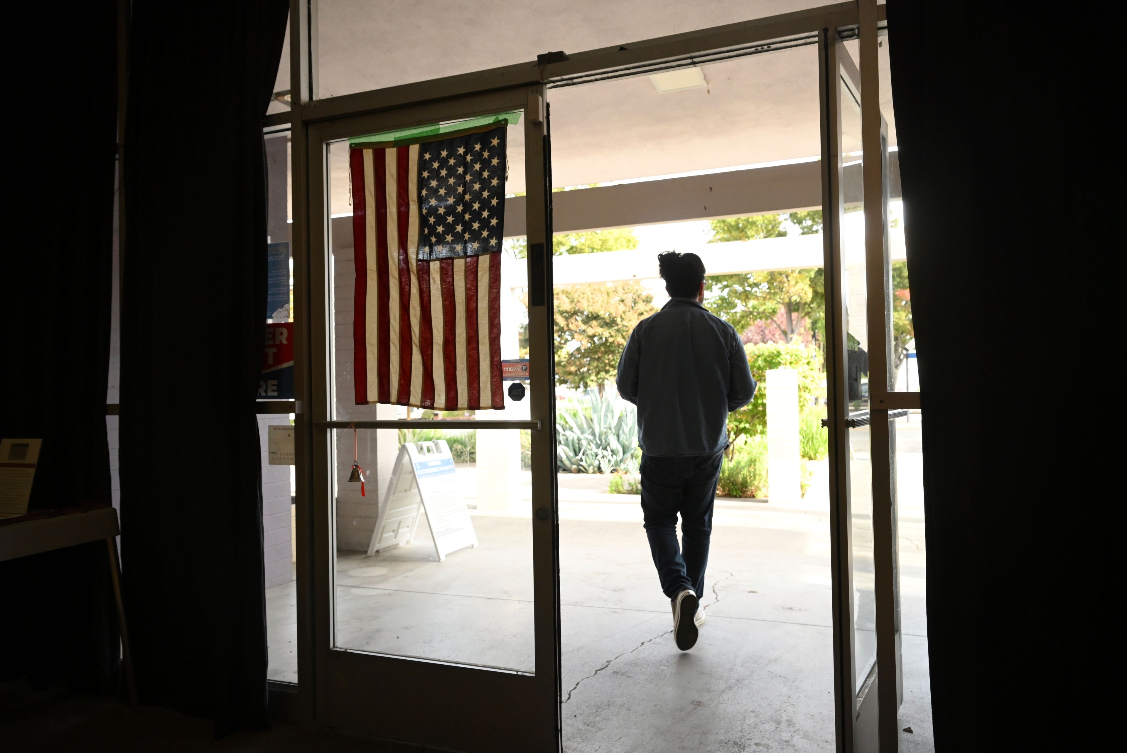 A voter leaves a polling place after casting his ballot in Gilroy, Calif., on Tuesday, Nov. 5, 2024. (AP Photo/Noah Berger)