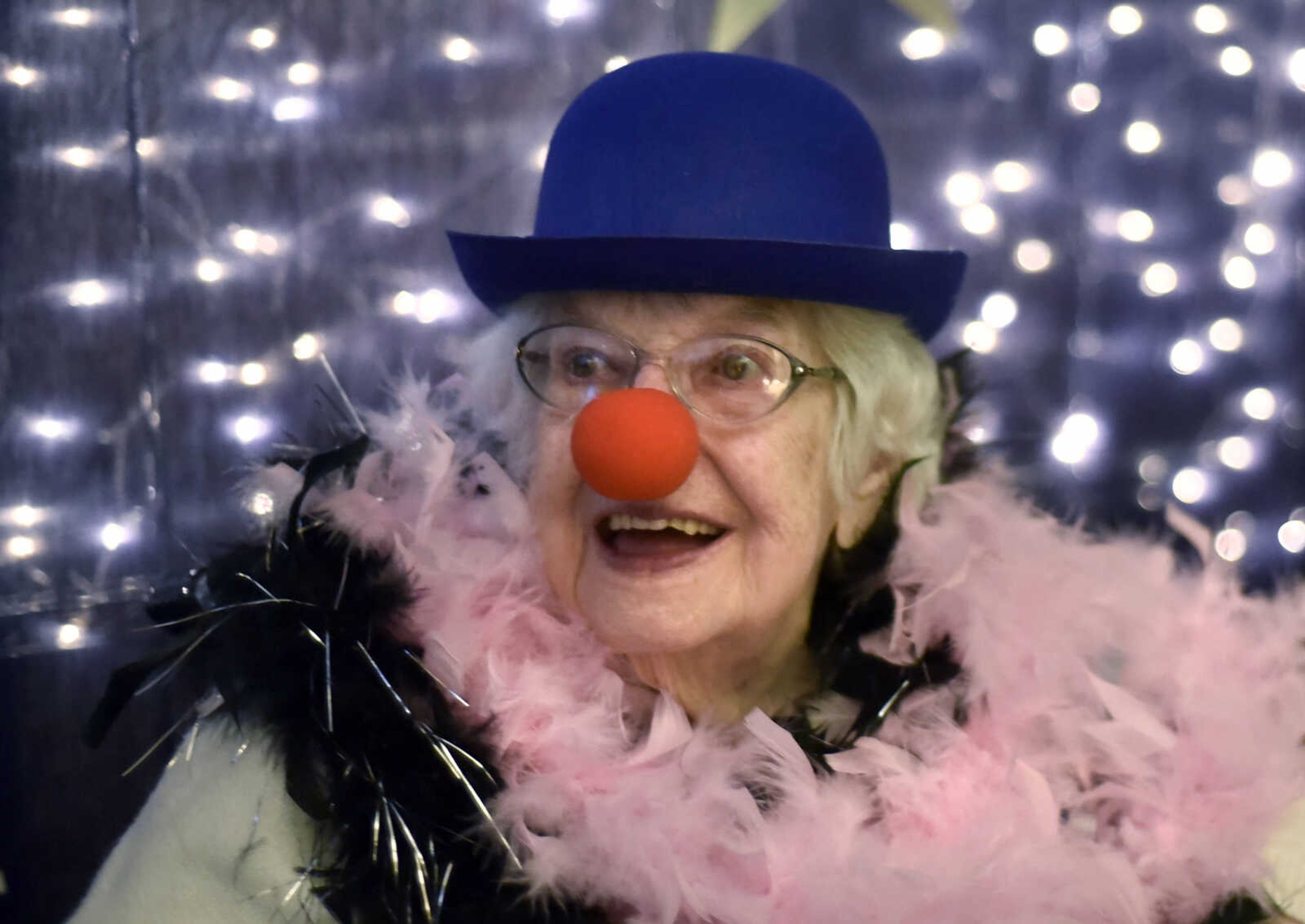 Dorothy Haselbauer has some fun in the photo booth during the "Celebration of Life" winter ball on Tuesday, Jan. 9, 2017, at Ratliff Care Center in Cape Girardeau.