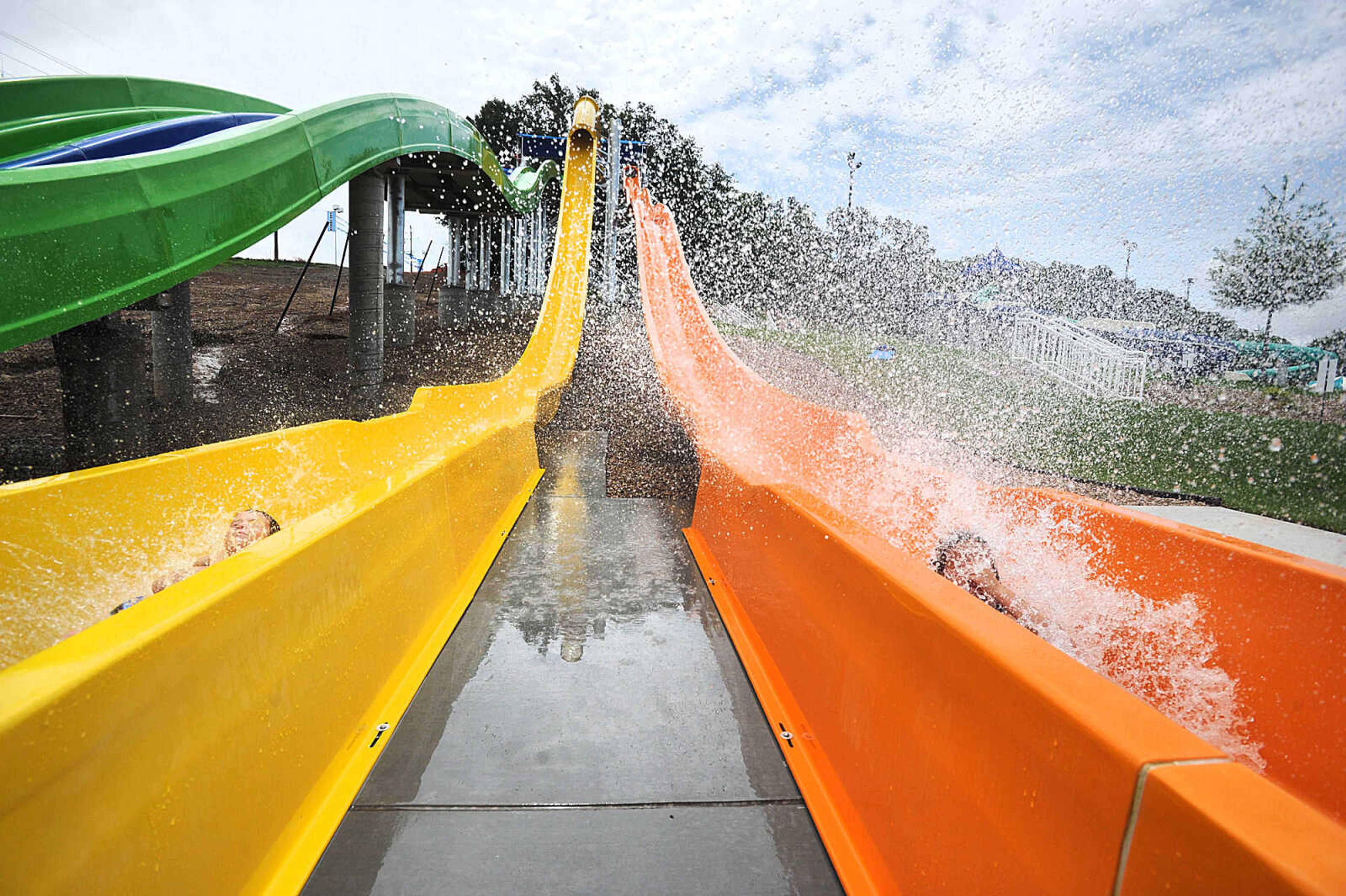 LAURA SIMON ~ lsimon@semissourian.com

The Cape Girardeau Parks and Recreation Department opened the new 265-foot-long free-fall slide, 259-foot-long triple-drop slide and a three-Lane 319-foot-long mat racer with 30-foot tower, at Cape Splash Family Aquatic Center, Thursday, July 9, 2015.