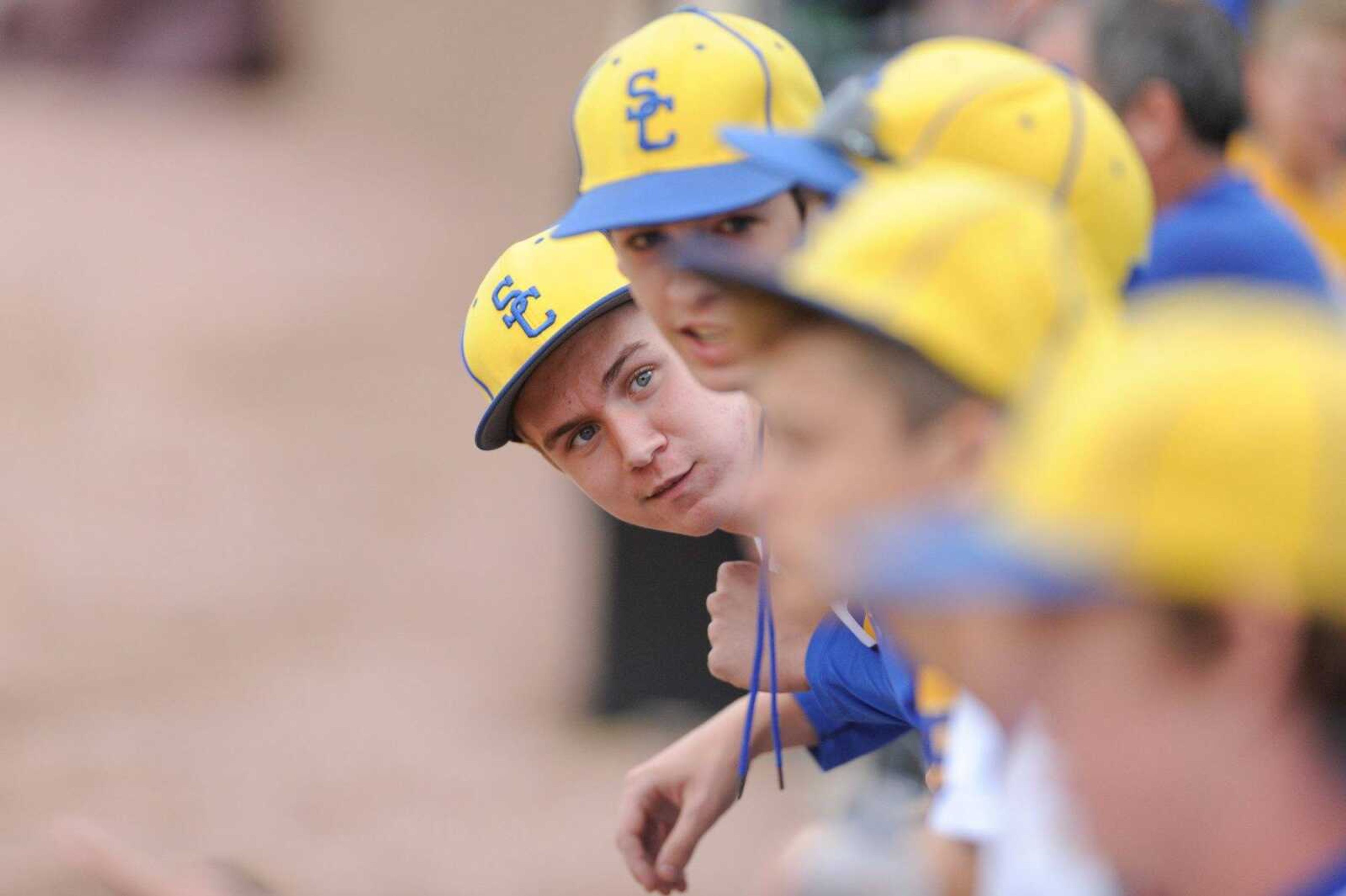 Scott City players talk with each other in the dugout during a Class 3 semifinal Monday, June 1, 2015 in O Fallon, Missouri. (Glenn Landberg)