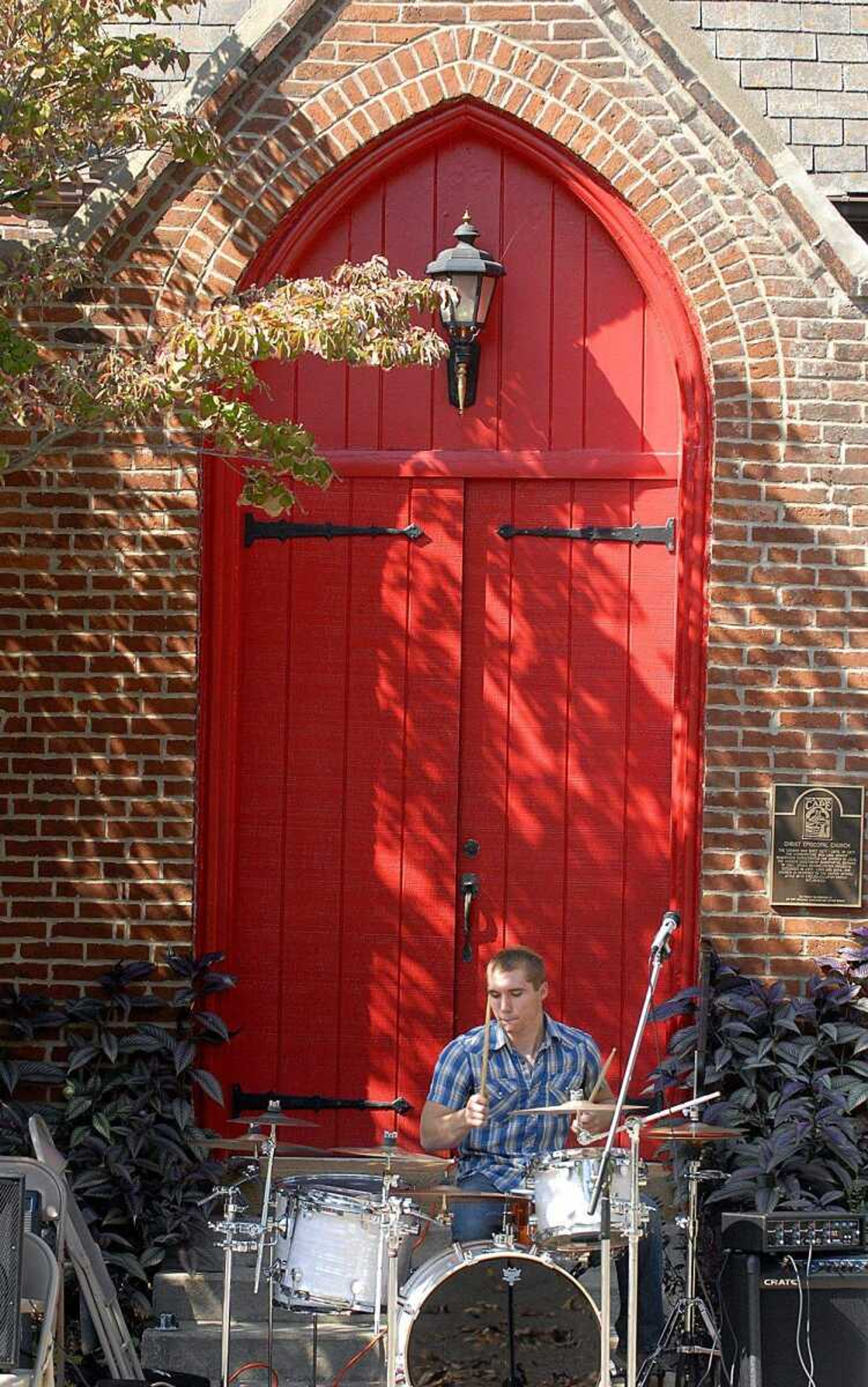 ELIZABETH DODD ~ edodd@semissourian.com
Zach Nickless, of Crystal City, performs with his band called Chasing Twilight at the Neighborhood Connections Block Party on Fountain Street in Cape Girardeau Saturday.