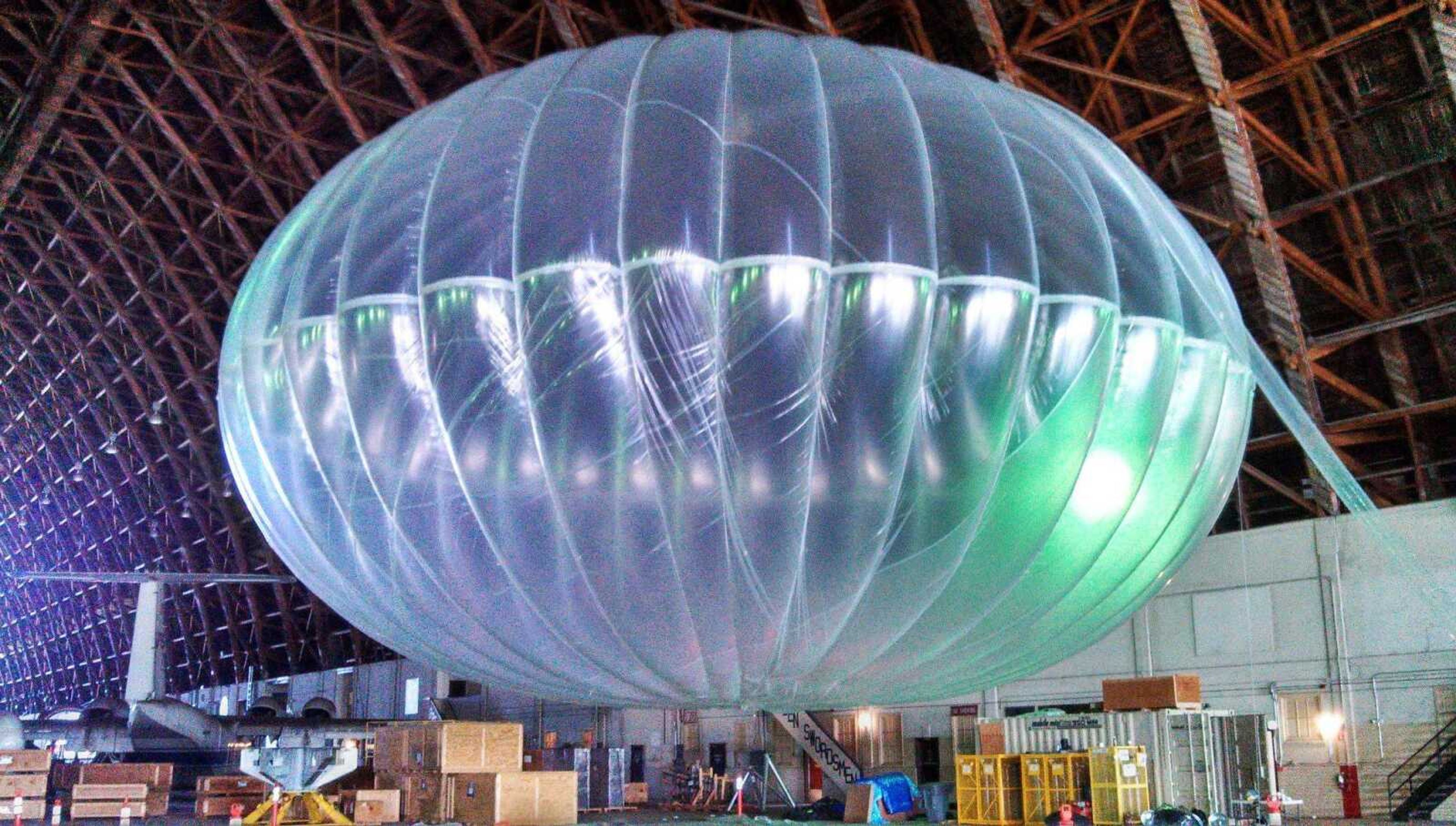 A fully inflated test balloon developed by Google sits in a hangar at Moffett Field airfield, Calif. Google is testing the balloons that sail in the stratosphere and beam the Internet to Earth. (Andrea Dunlap ~ Google)