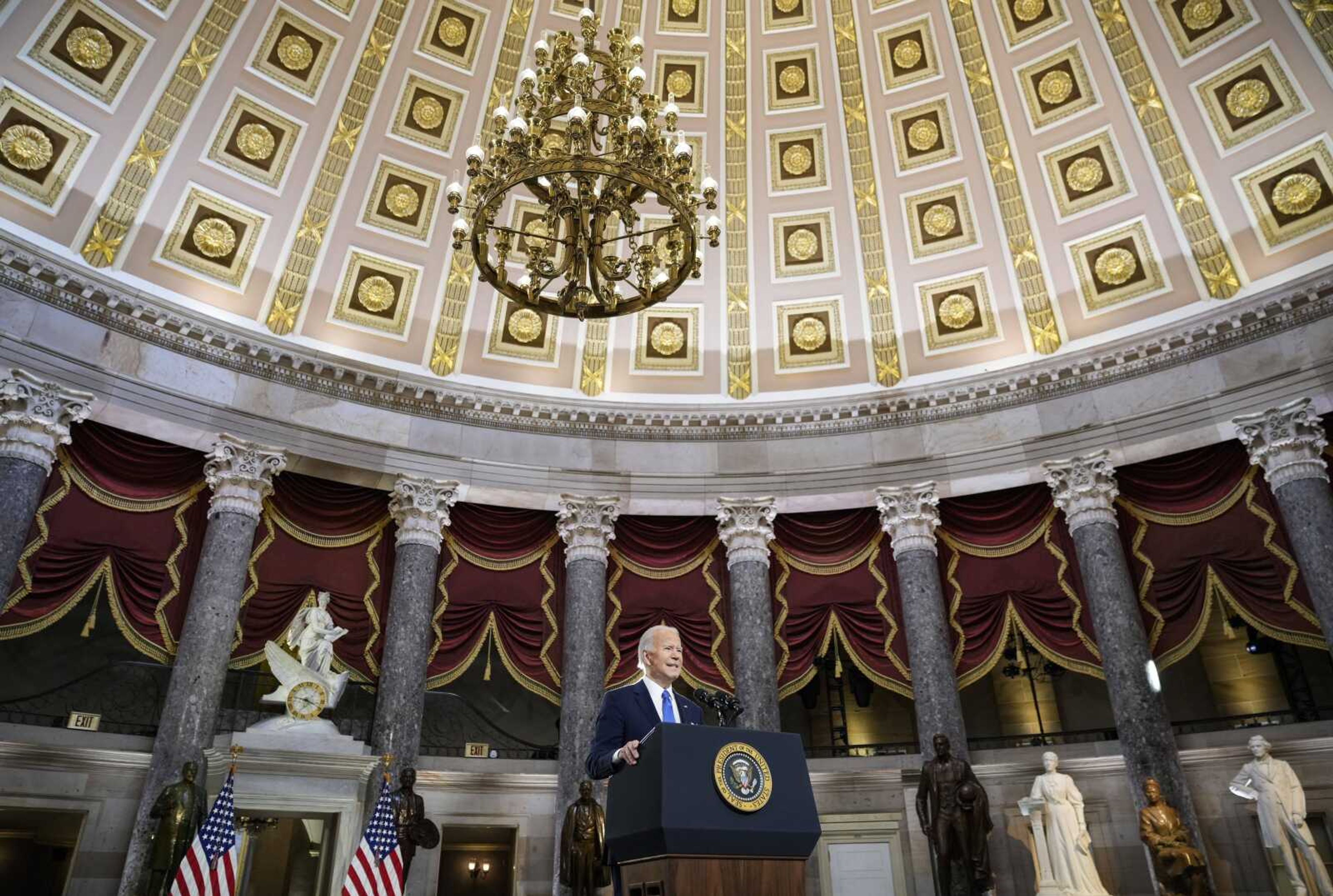 President Joe Biden delivers remarks on the one year anniversary of the January 6 attack on the U.S. Capitol, during a ceremony in Statuary Hall, Thursday,  Jan. 6, 2022 at the Capitol in Washington. 