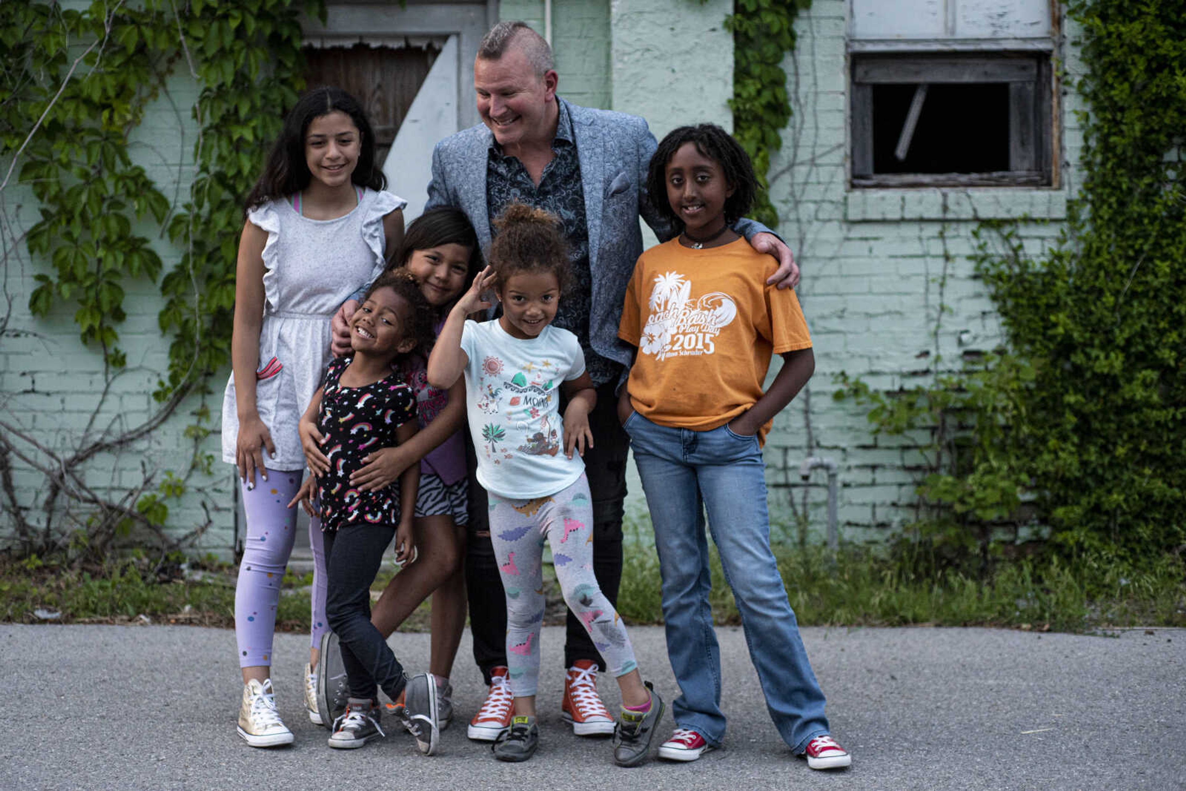 Dr. Eric Becking poses for a photo with his daughters, from left, Bianca, 12, Lennie, 4, Arianna, 7, Dolly, 5, and Solie, 10, Monday, June 3, 2019, in Cape Girardeau.