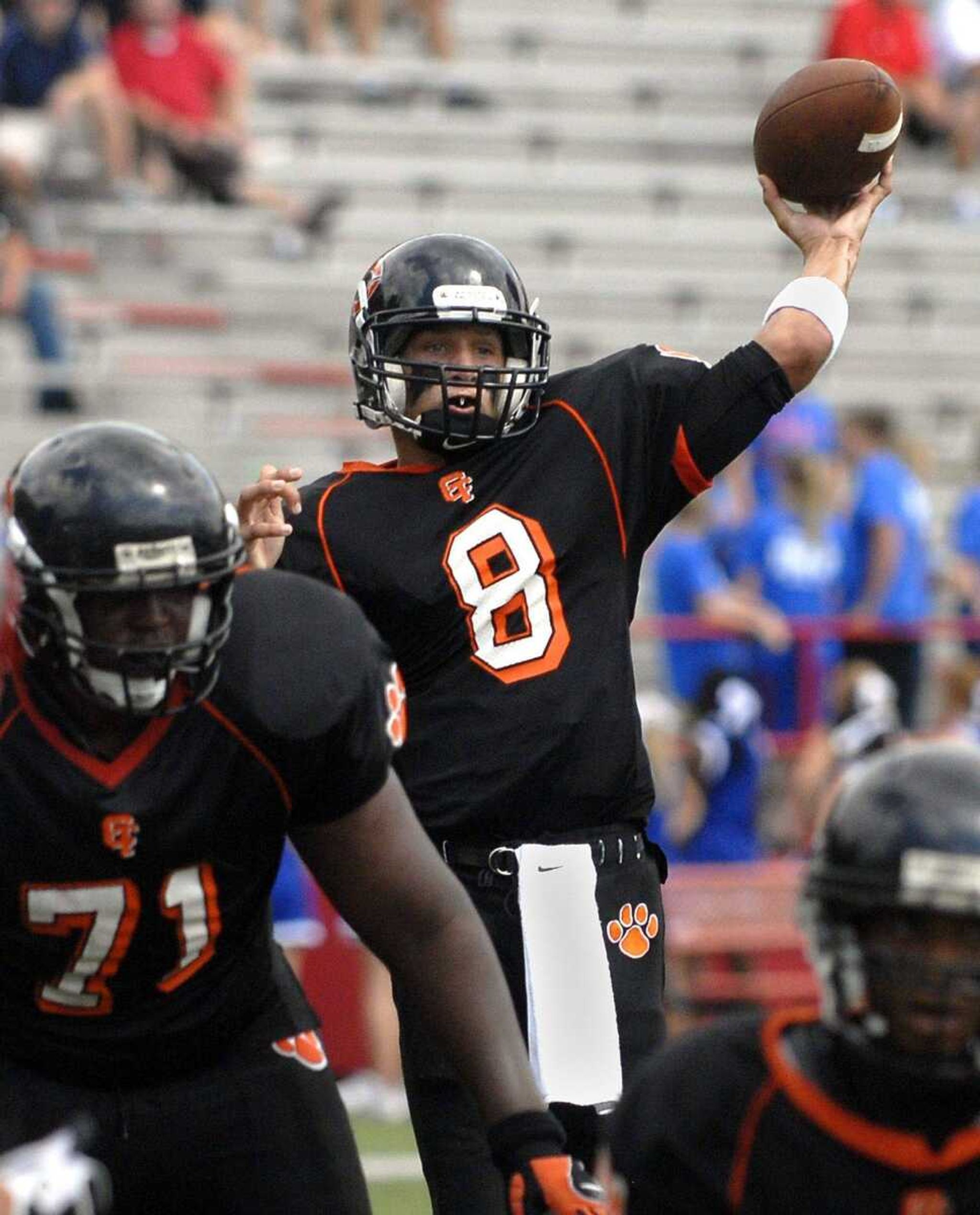 Central quarterback Christian Cavaness throws a touchdown pass against Obion County during the second quarter Saturday.