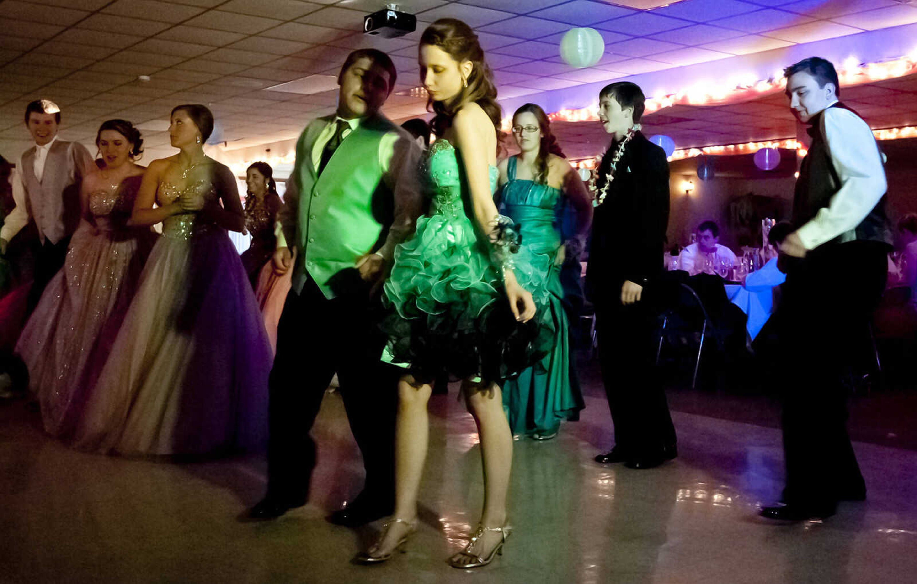 The Oak Ridge High School prom, "Passport to Paradise," 
Saturday, April 26, at the Knights of Columbus Hall in Jackson, Mo.