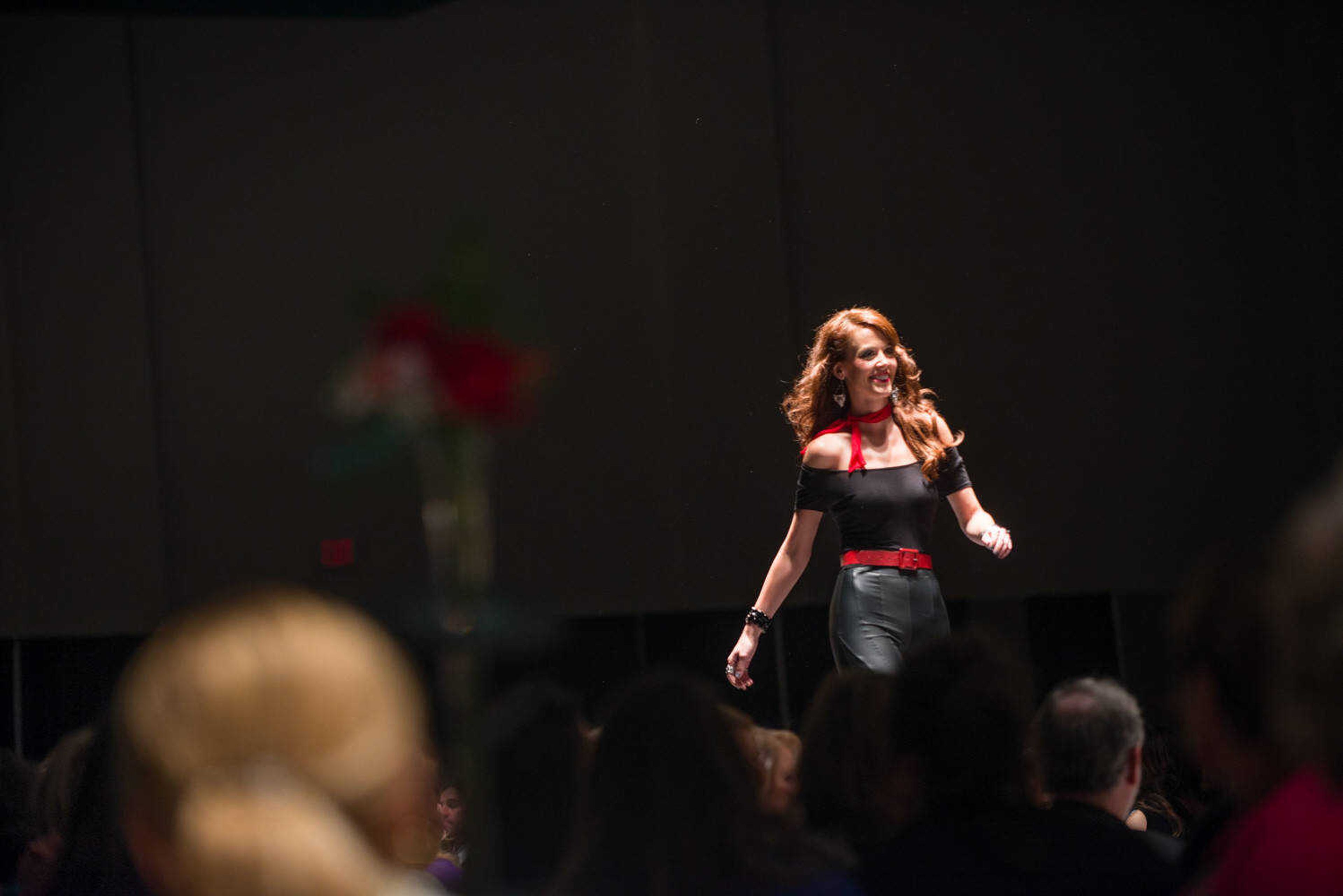 AARON EISENHAUER ~ photos@semissourian.com
Erin Fluegge-Woolf, reigning Mrs. Missouri, walks the runway during the fifth annual VintageNOW fashion show, a fundraiser for Safe House for Women, at the Osage Centre on Friday, October 17, 2014.