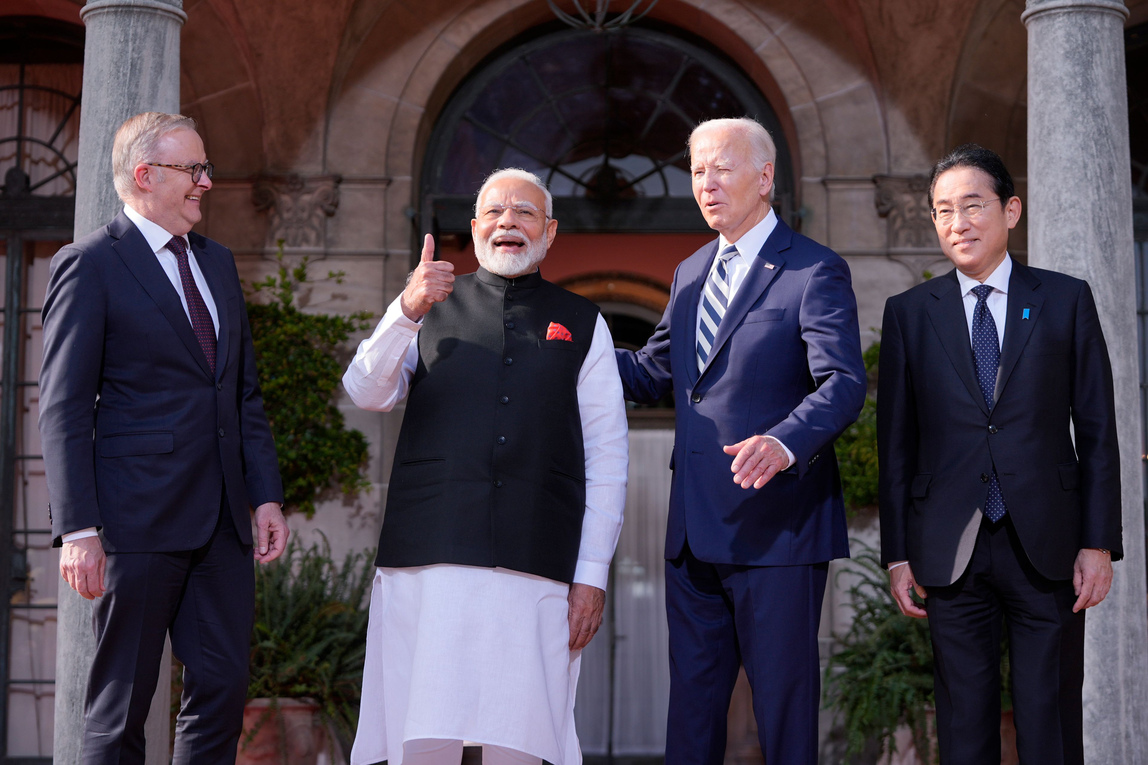 President Joe Biden greets from left, Australia's Prime Minister Anthony Albanese, India's Prime Minister Narendra Modi and Japan's Prime Minister Fumio Kishida, at the Quad leaders summit at Archmere Academy in Claymont, Del., Saturday, Sept. 21, 2024. (AP Photo/Mark Schiefelbein)