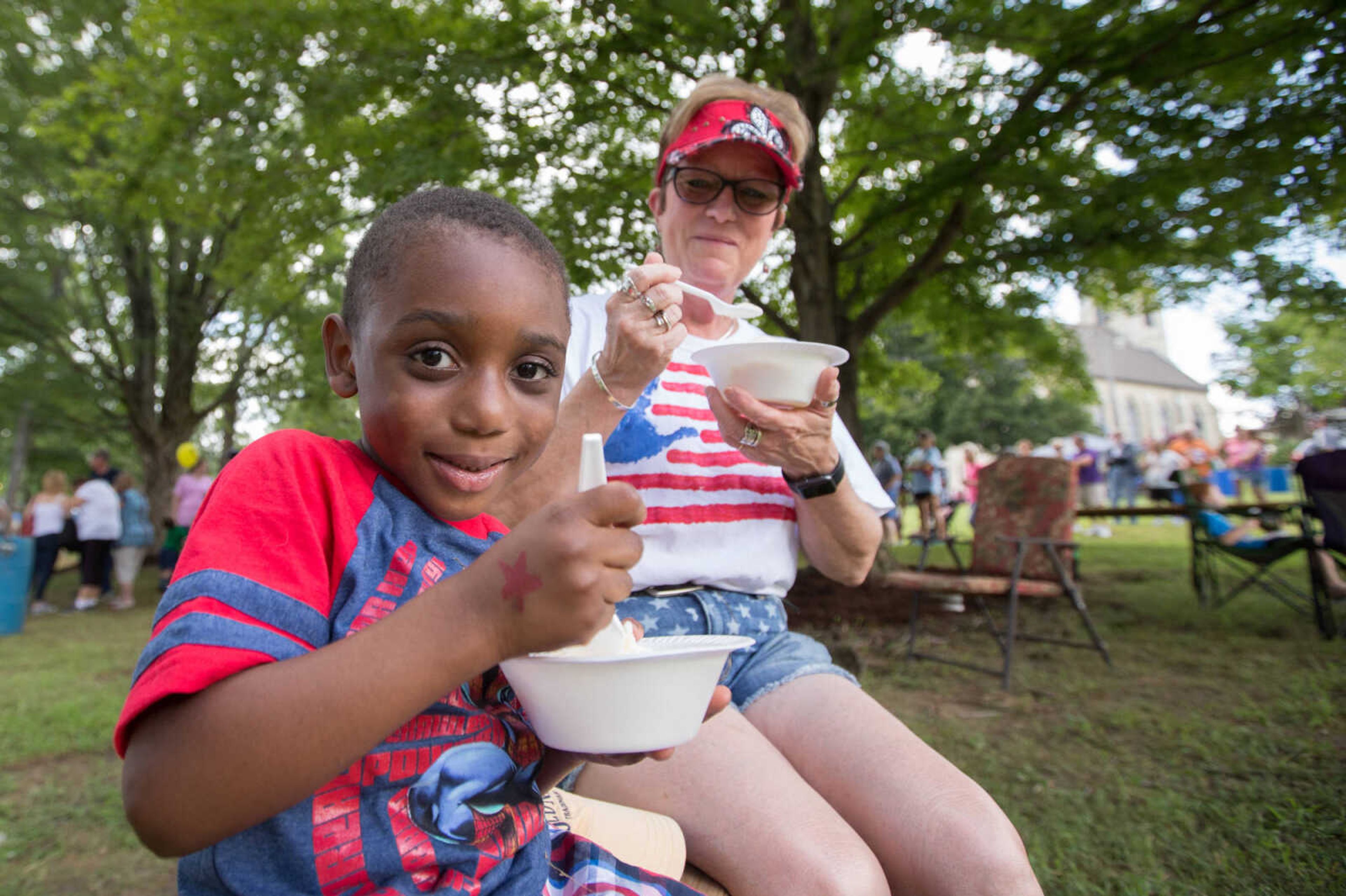 GLENN LANDBERG ~ glandberg@semissourian.com


D.J. Turner and his friend Darlene Bullinger enjoy some homemade ice cream during the the annual parish picnic on Saturday, July 30, 2016 at St. John's Catholic Church in Leopold, Mo.