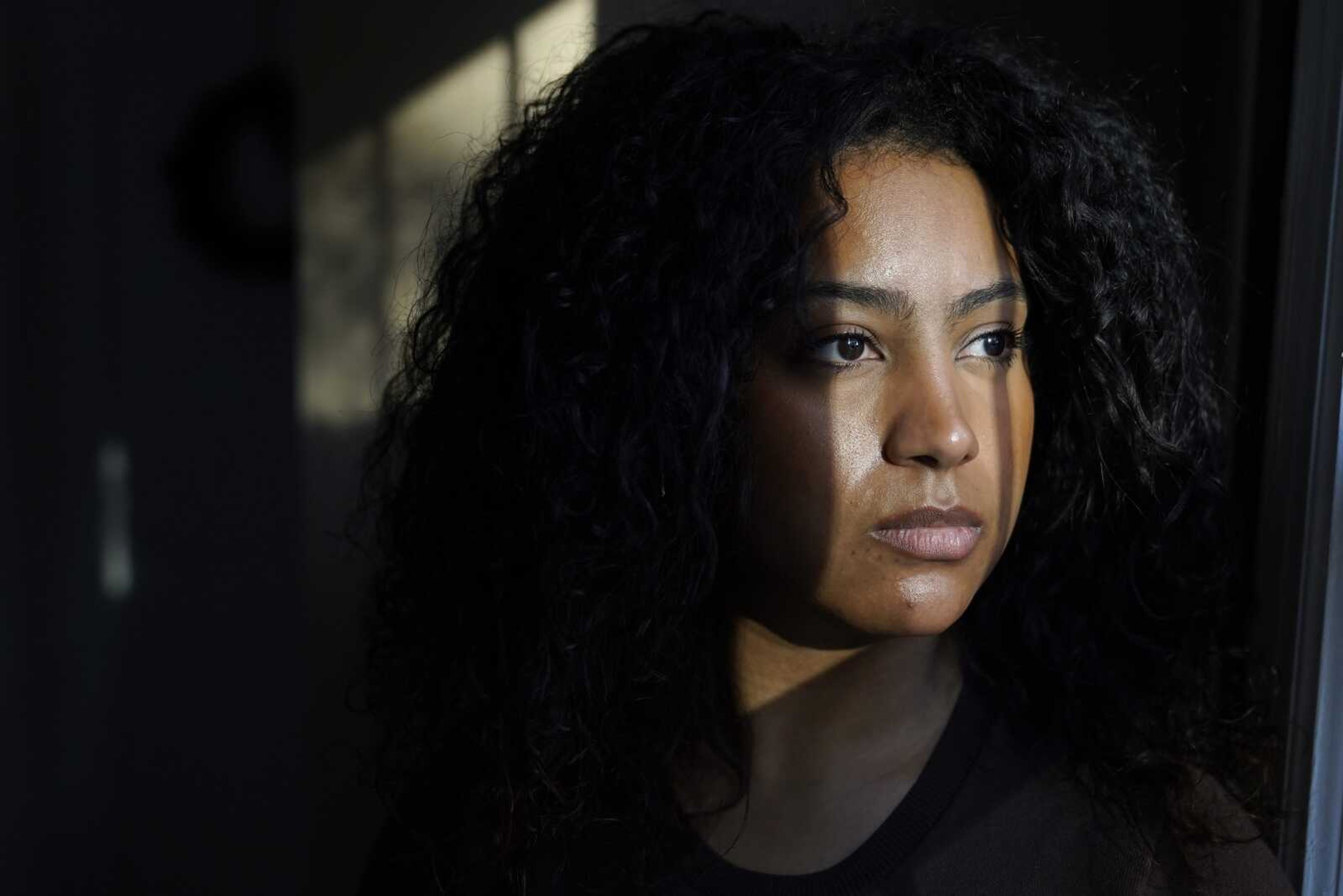 Pariss Chandler, founder of the recruitment platform website Black Tech Pipeline, sits for a photograph at her home Thursday, Nov. 3, in Randolph, Massachusetts. Chandler built a community for Black tech workers on Twitter that eventually became the foundation for her own recruitment company.