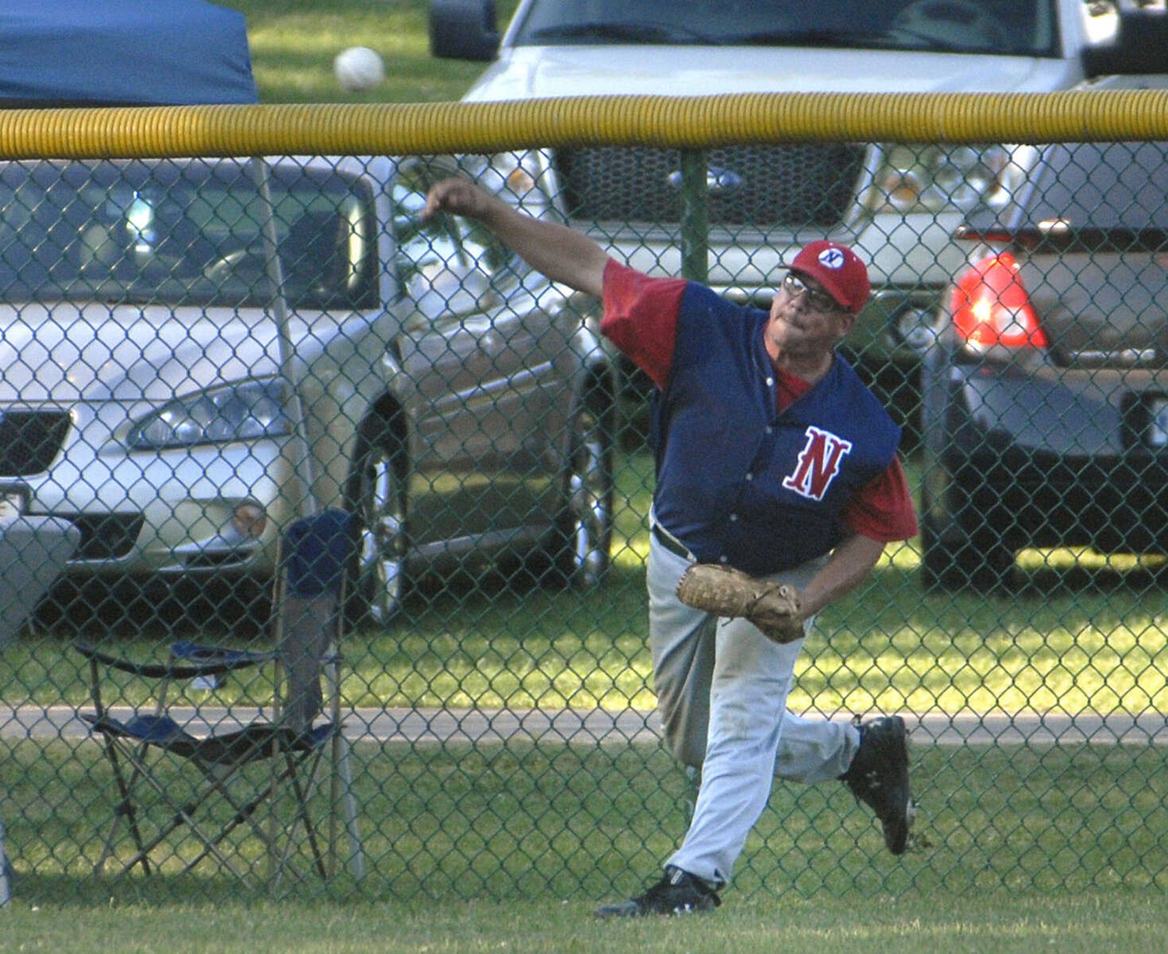 Nokomis Bud Light's leftfielder Joe Shimkees throws the ball in after a hit by Decatur Pride Sunday at the Kelso Klassic.