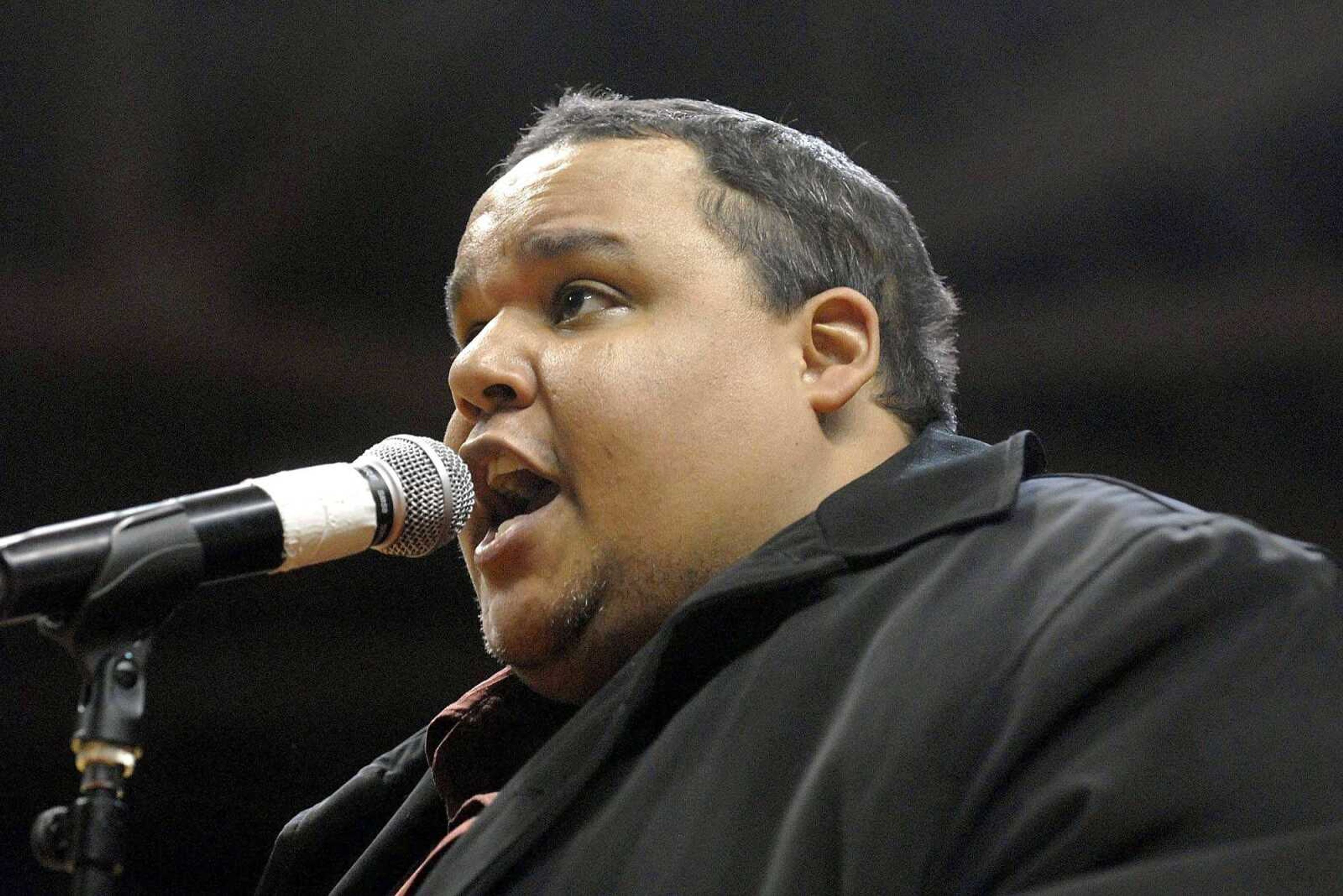 Neal E. Boyd sings the national anthem in February 2009 at the Show Me Center. Boyd is using his difficult rehab from a car wreck as inspiration for his new album to come out next year. Boyd broke many bones and may need a hip replacement.