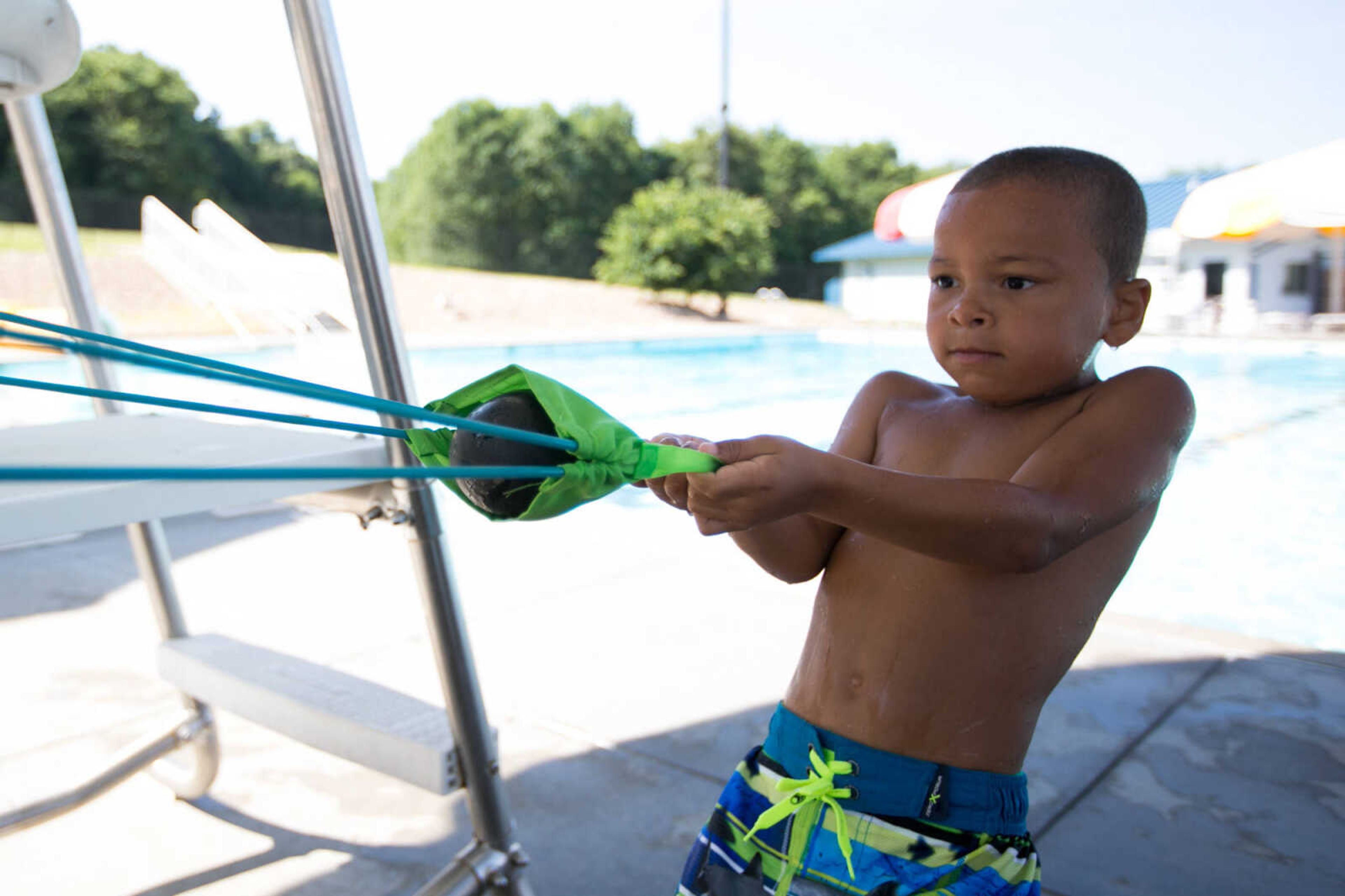 GLENN LANDBERG ~ glandberg@semissourian.com

Jamar Ivory Jr. launches a water balloon at a target during the Mermaid and Pirate Party at Cape Splash Saturday, June 18, 2016 in Cape Girardeau.