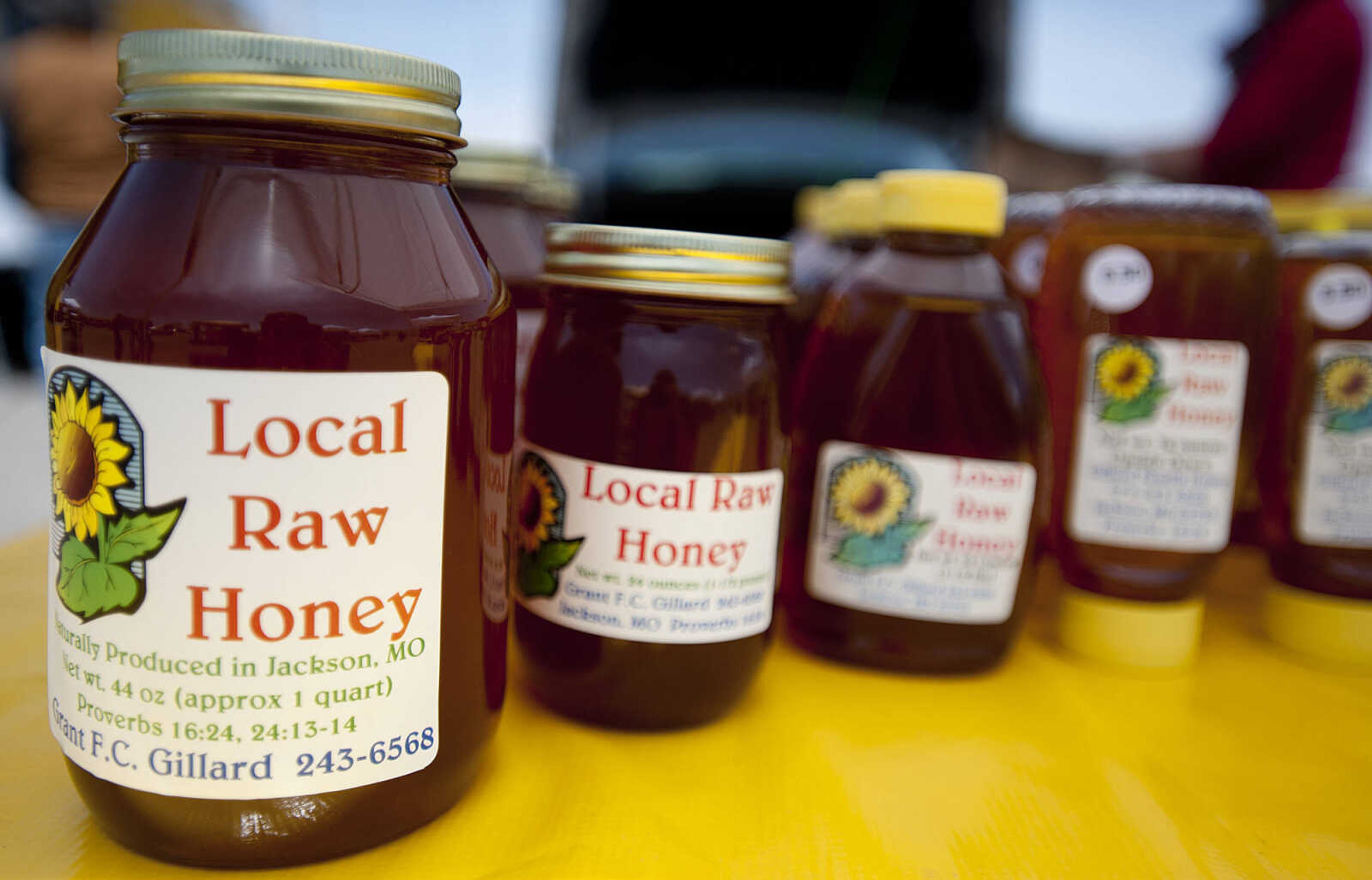 Raw honey for sale at Grant Gillard's booth on the first day of the Cape Farmer's Market Thursday, April 17, at West Park Mall in Cape Girardeau. The market is open from 12:00 p.m. to 5 p.m. on Thursdays and is located in the mall's east parking lot which is accessible from the Mt. Auburn Road entrance.