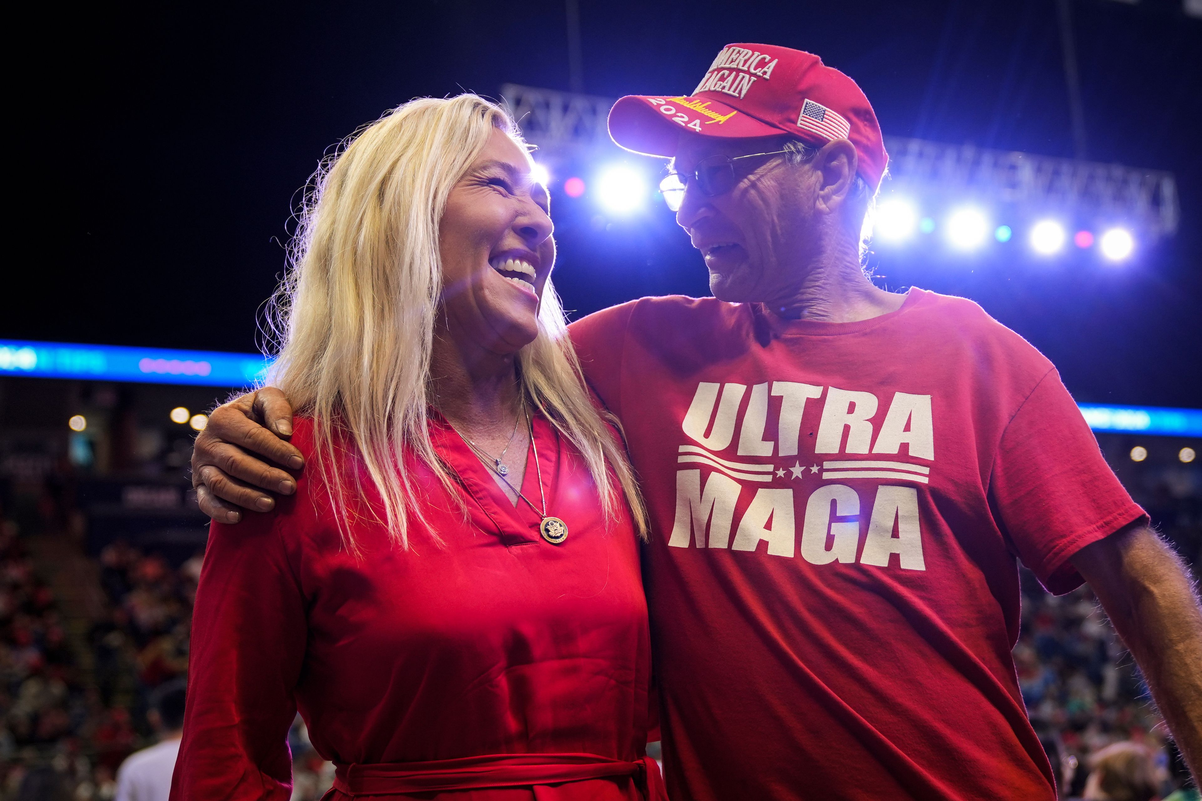 Rep. Marjorie Taylor Greene, R-Ga., left, poses with an attendee at a Republican presidential nominee former President Donald Trump campaign event in State College, Pa., Saturday, Oct. 26, 2024. (AP Photo/Matt Rourke)