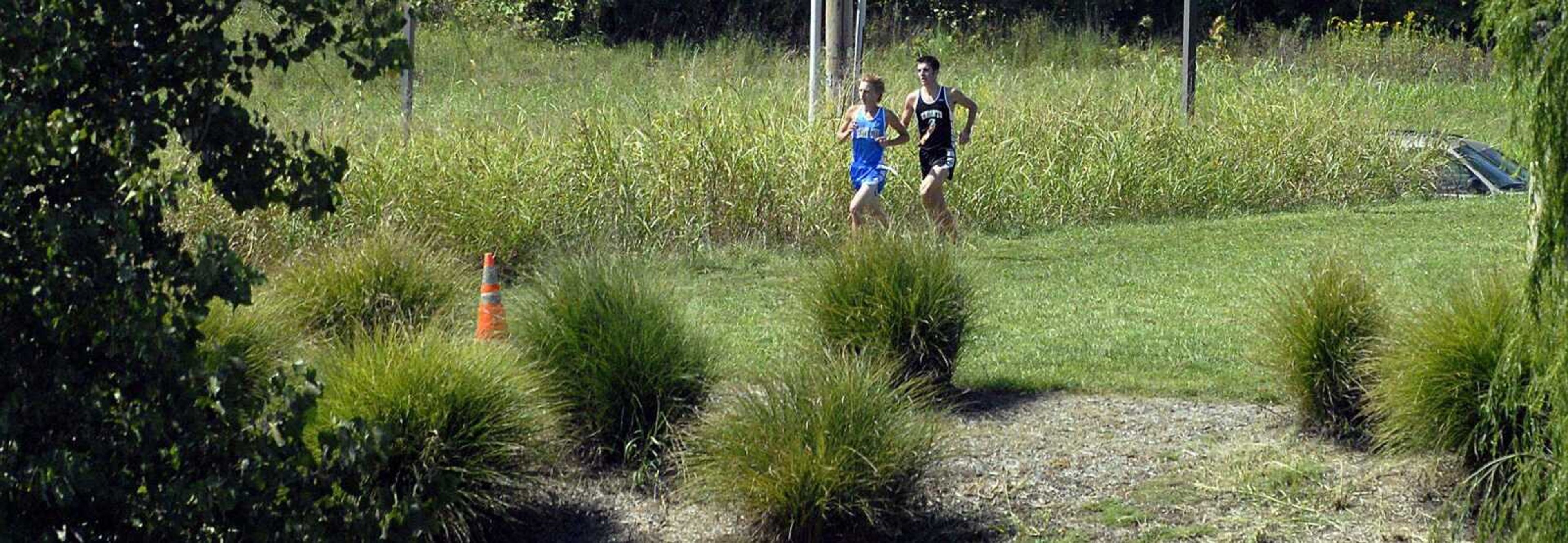 Scott City junior Brandon Shemonia stretches his lead over Farmington senior Colton Wooldridge during Saturday's race at Central. (Laura Simon)