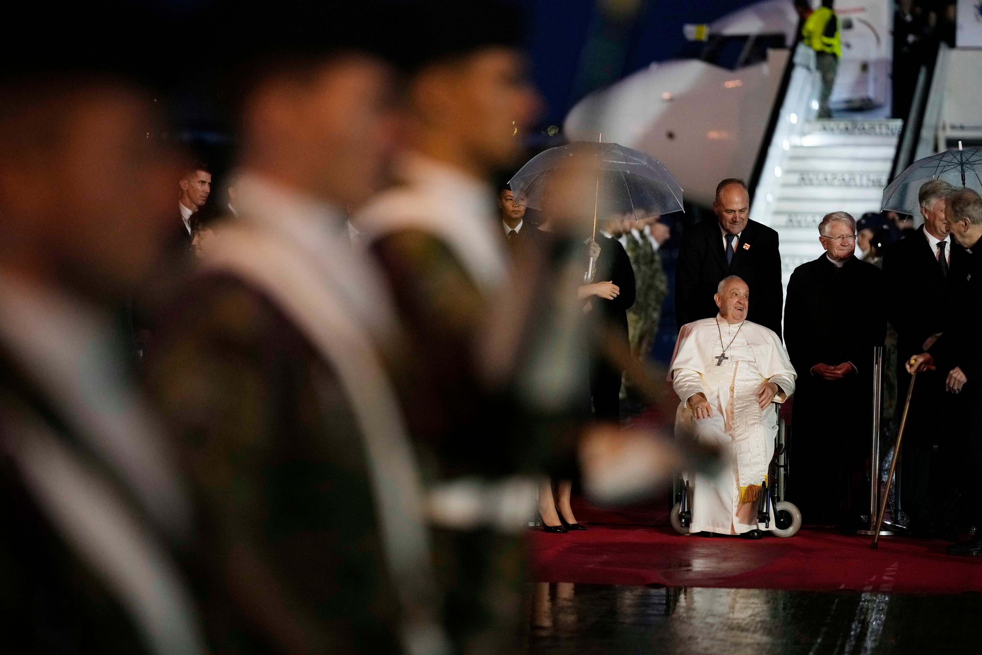 Pope Francis arrives at the Melsbroek air base in Steenokkerzeel, near Brussels, on the first day of his four-day visit to Luxembourg and Belgium, Thursday, Sept. 26, 2024. (AP Photo/Andrew Medichini)