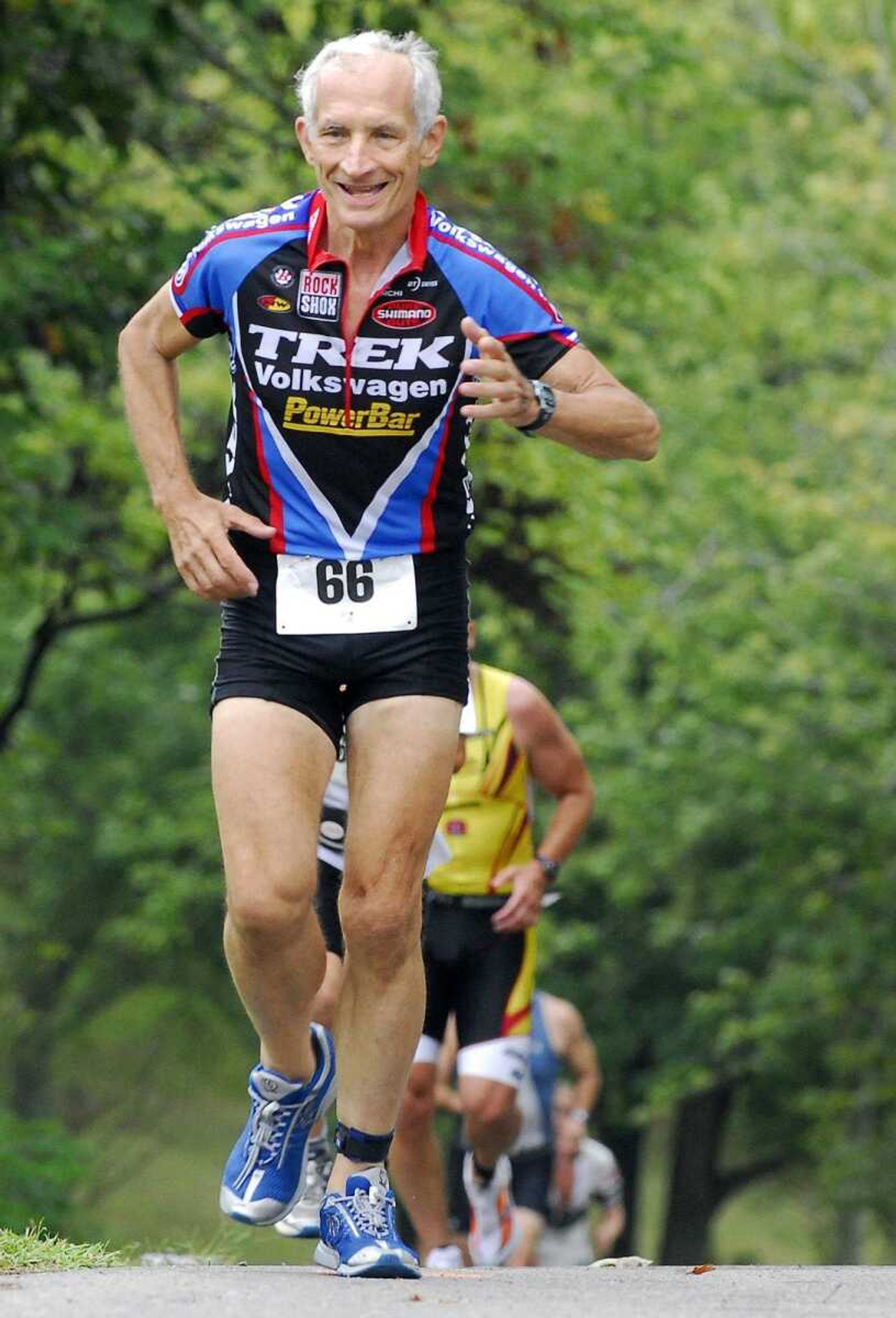 Jim Wright pushes up a hill Saturday during the run portion of the Trail of Tears triathlon. Check out more photos from the race at semoball.com.