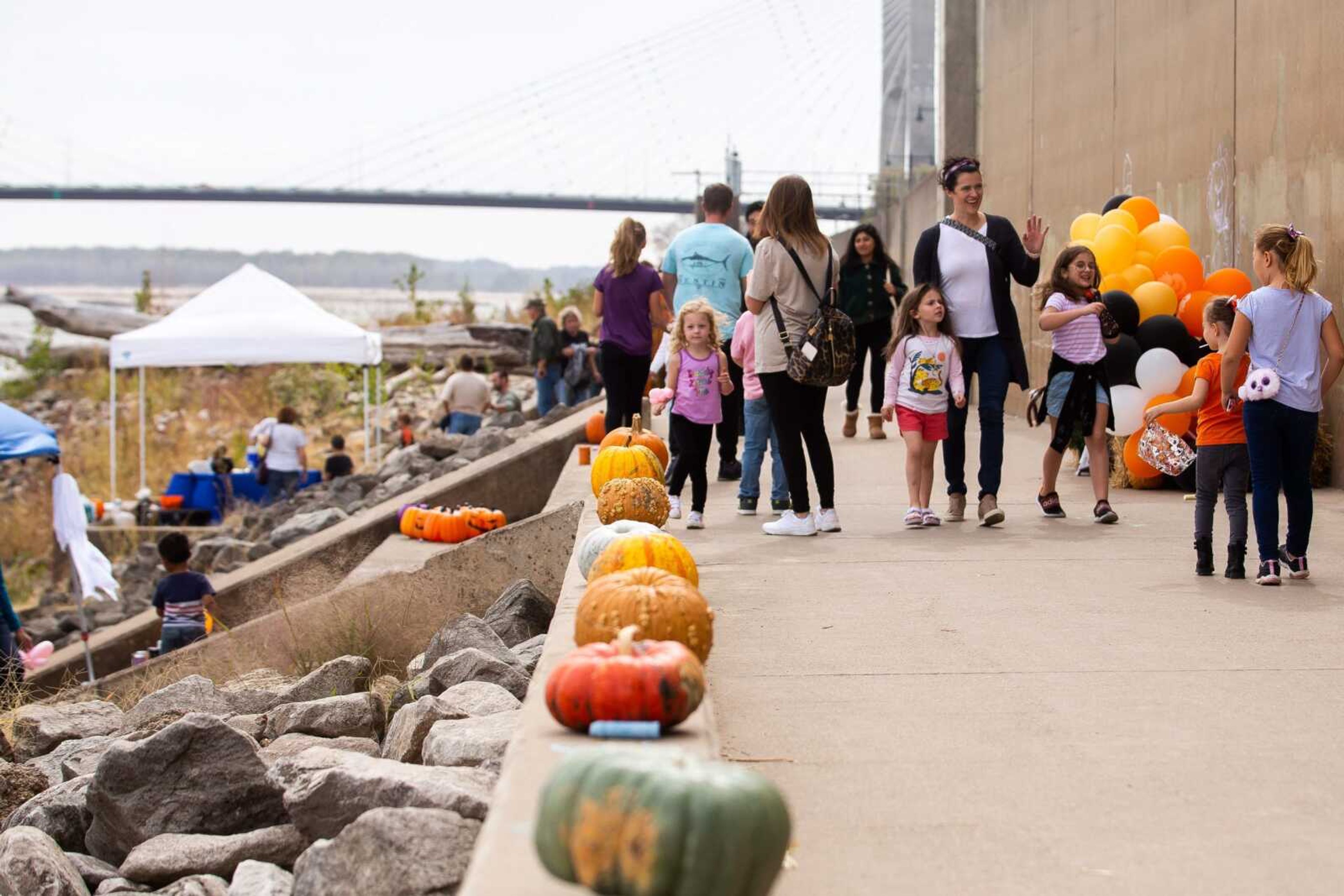 Pumpkins line the riverfront walk Oct. 22 at the Riverfront Fall Festival in Cape Girardeau.