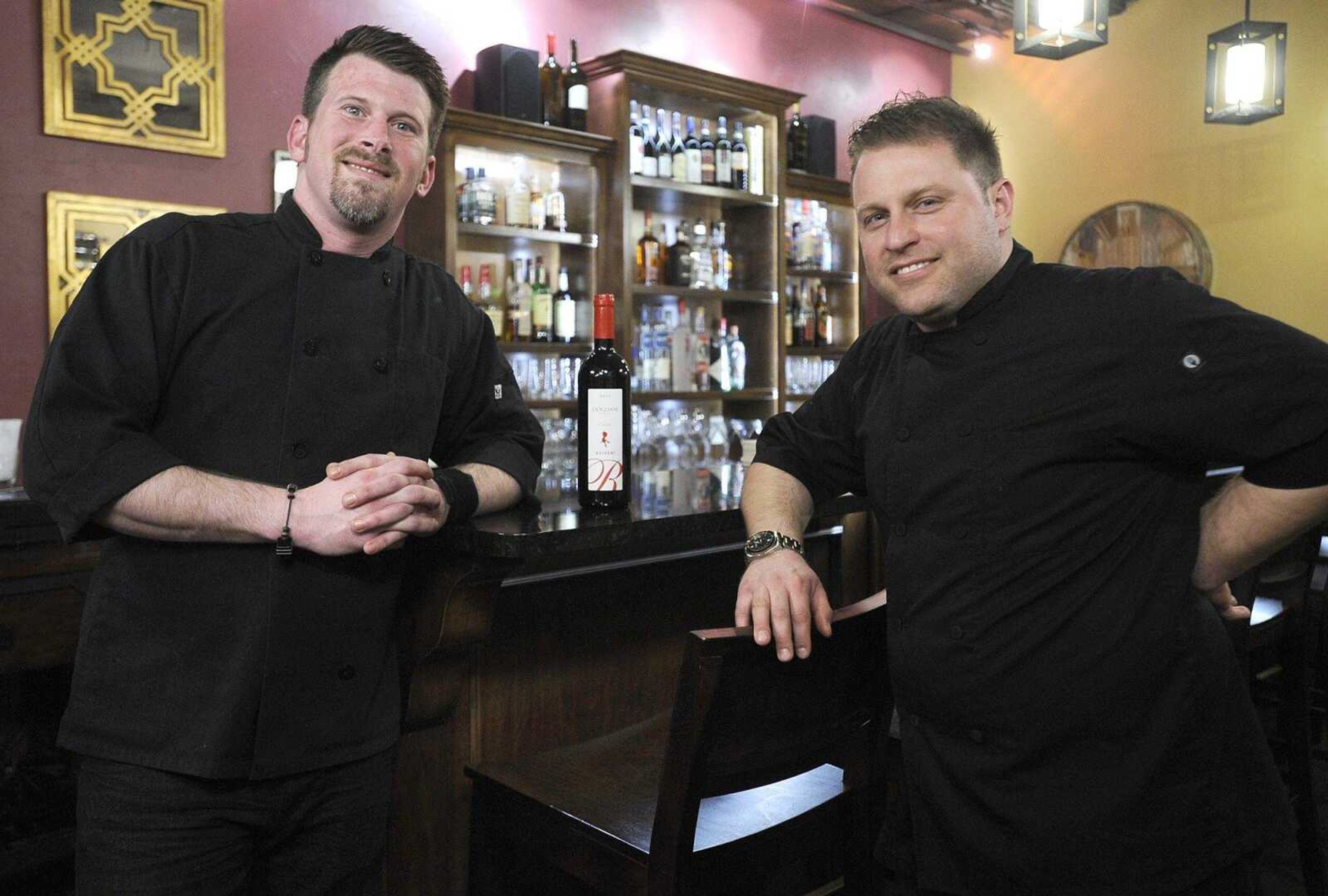 Jeremy Bourland, left, and Gabriele Ruggieri stand at the bar Friday at Gabriel's Food + Wine, 127 N. Main St. in Cape Girardeau.