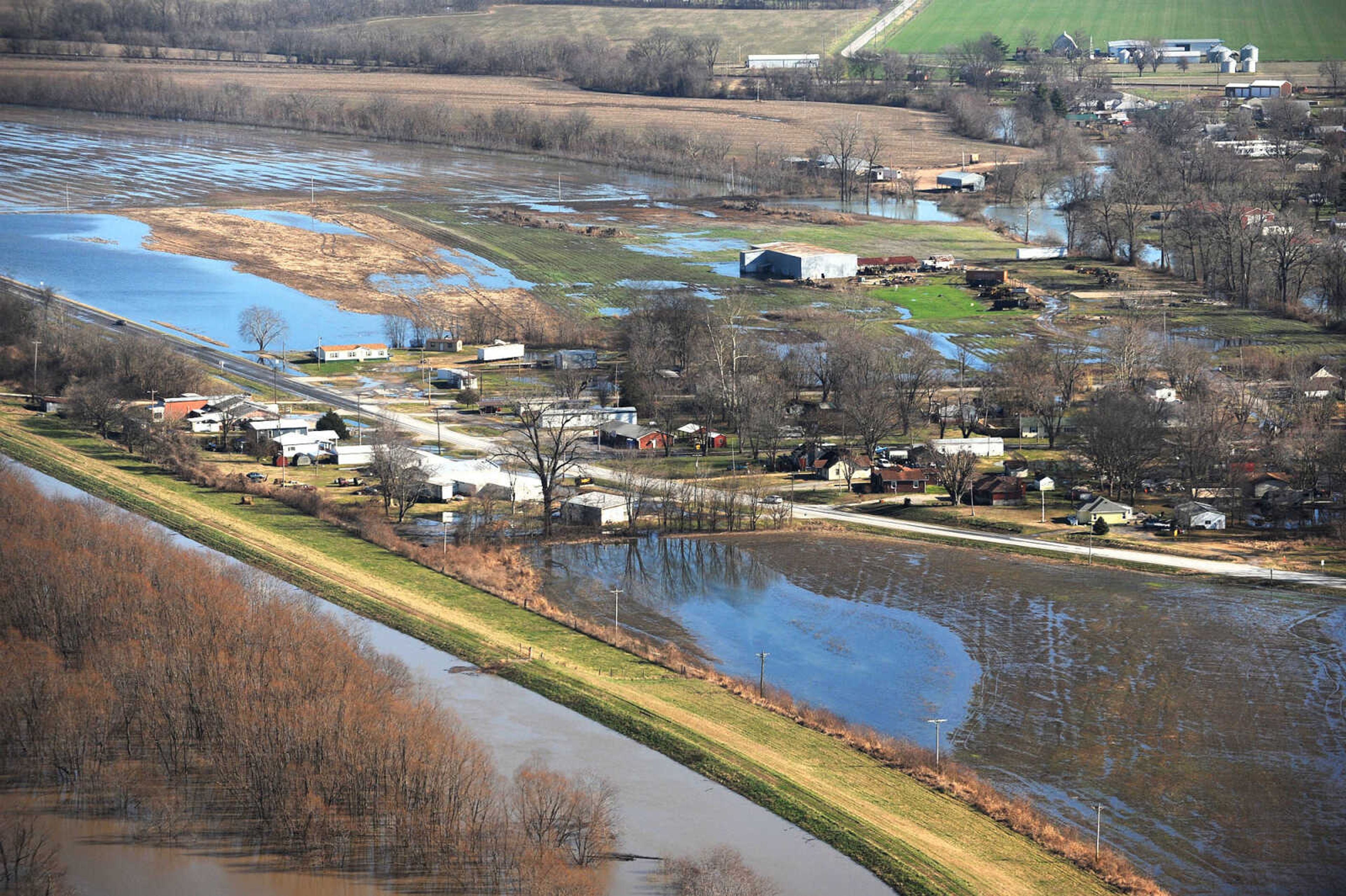 LAURA SIMON ~ lsimon@semissourian.com

Water seeps into portions of McClure, Illinois as the swollen Mississippi River pushes against the levee protecting the Southern Illinois town, Saturday, Jan. 2, 2016.