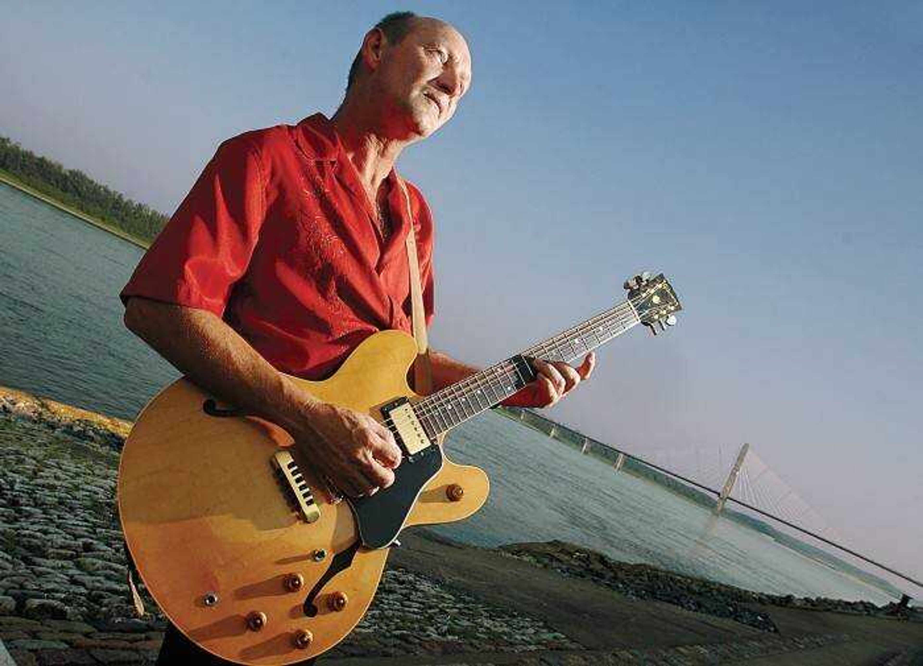 Bruce Zimmerman, a veteran of more than 20 years in the Cape Girardeau music scene, will release his first CD, "Guitar on the Brain," Saturday with a special CD release show at Port Cape. (Aaron Eisenhauer)