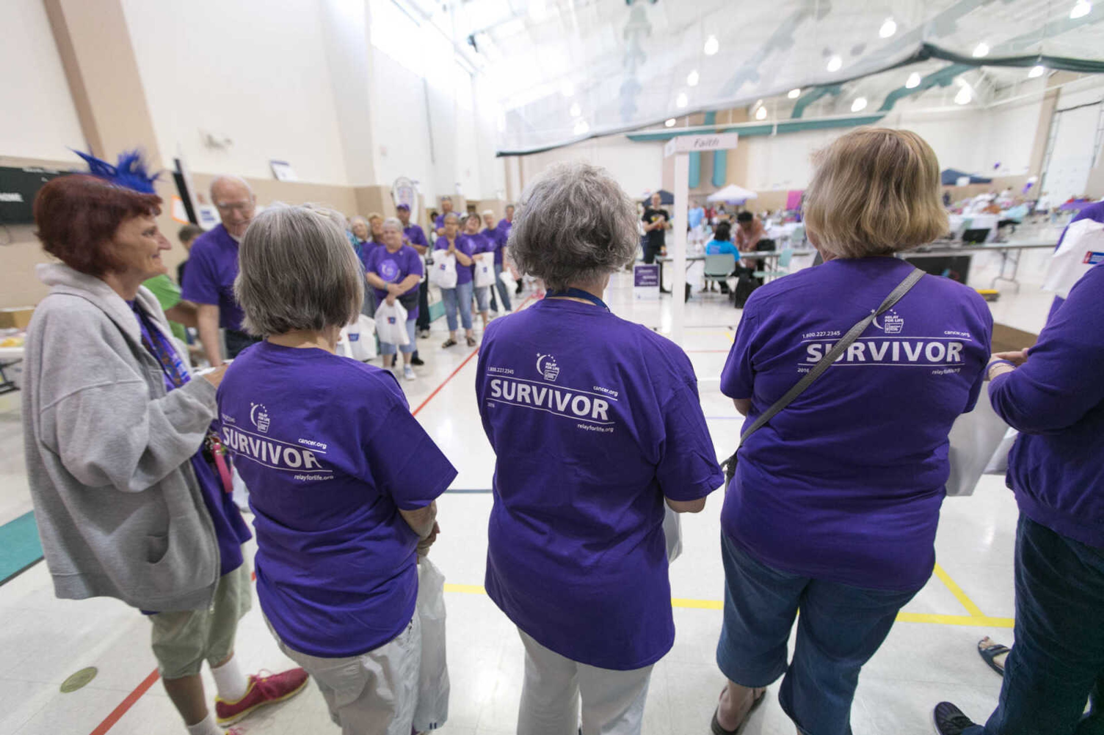 GLENN LANDBERG ~ glandberg@semissourian.com


Cancer survivors introduce themselves at the beginning of the cancer survivor's lap at the Relay for Life of Cape Girardeau County fundraiser in the Osage Centre, Saturday, May 7, 2016.