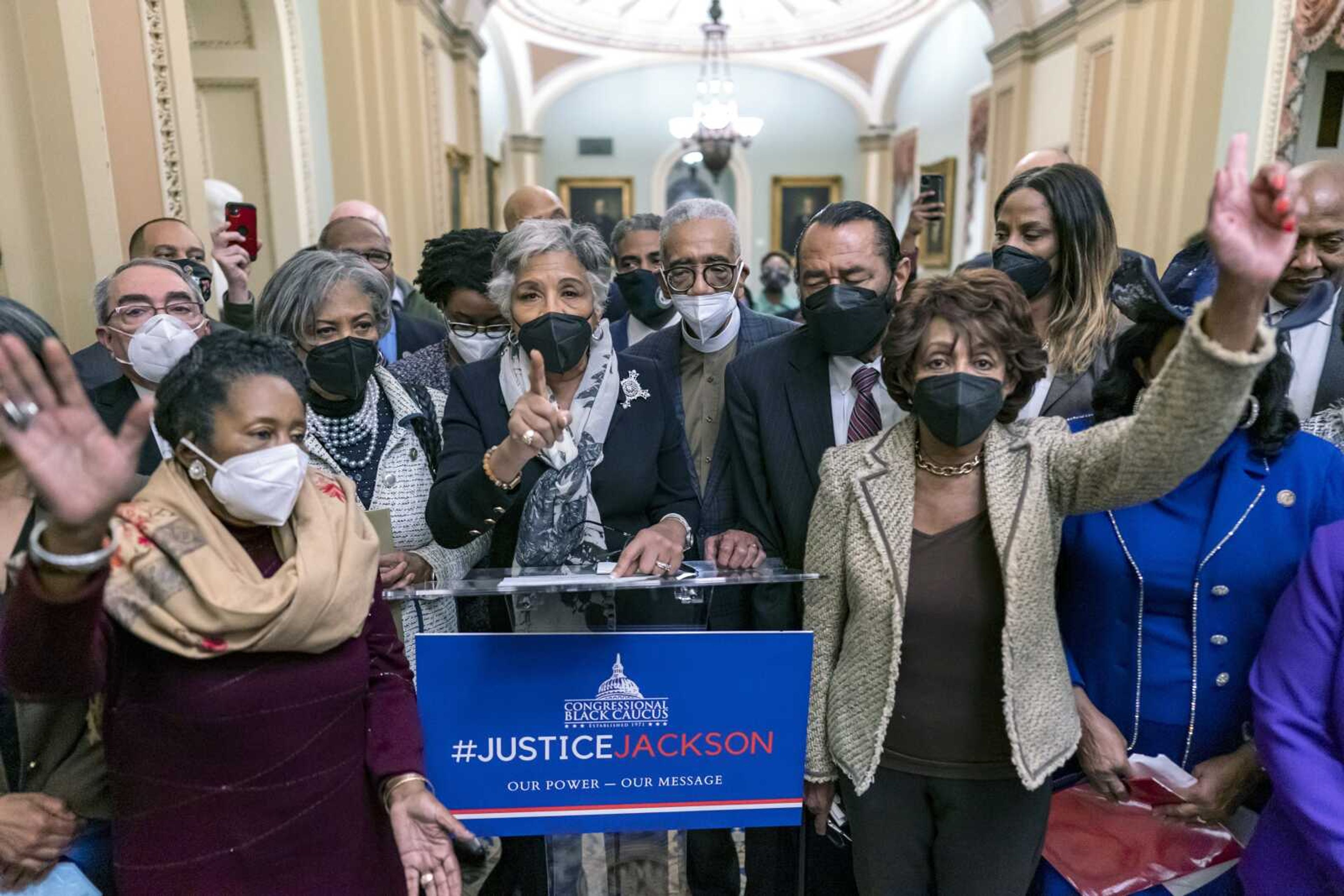 Members of the Congressional Black Caucus, with Rep. Sheila Jackson Lee, D-Tex., left, Rep. Joyce Beatty, D-Ohio, center, and Rep. Maxine Waters, D-Calif., right, speak to reporters outside the Senate chamber Thursday just after the vote to confirm Supreme Court nominee Ketanji Brown Jackson, securing her place as the first Black woman on the high court, at the Capitol in Washington.