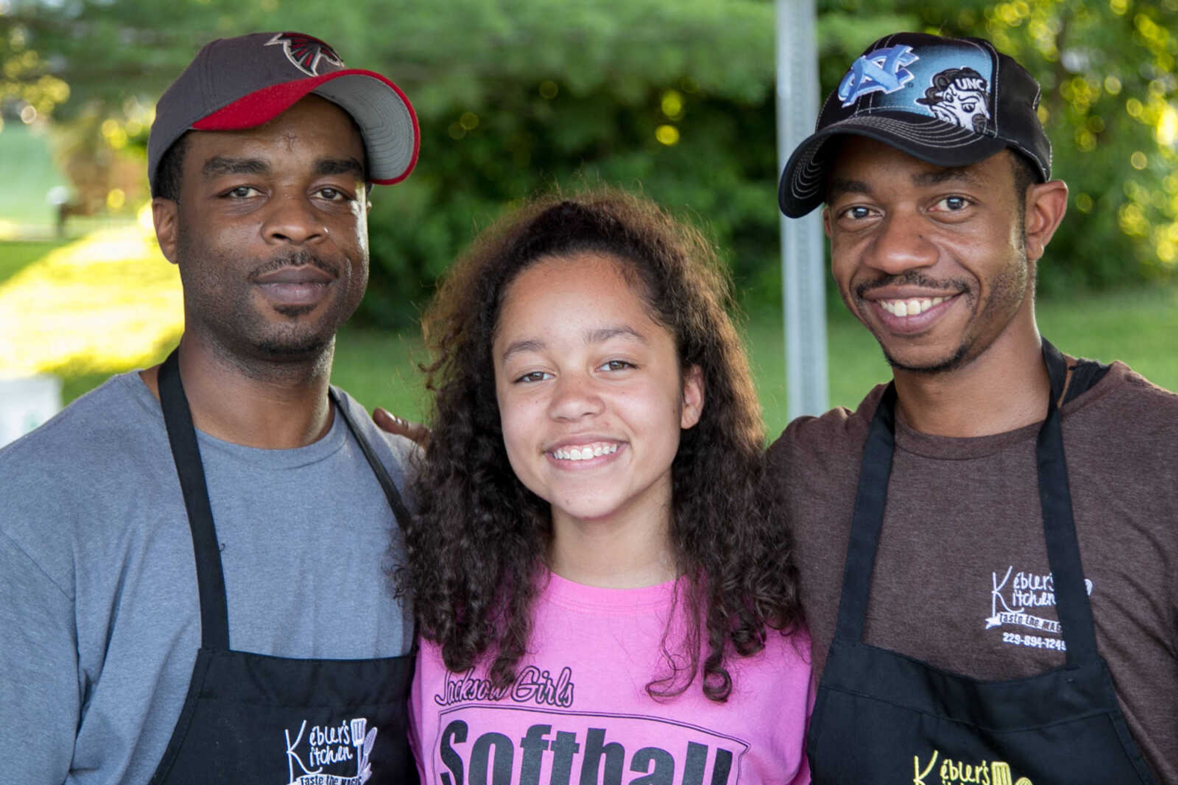 GLENN LANDBERG ~ glandberg@semissourian.com

Lathan, Brieanna and Jason Barnett pose for a photo during Rockin' the Park at the Jackson City Park Bandshell Saturday, June 11, 2016.