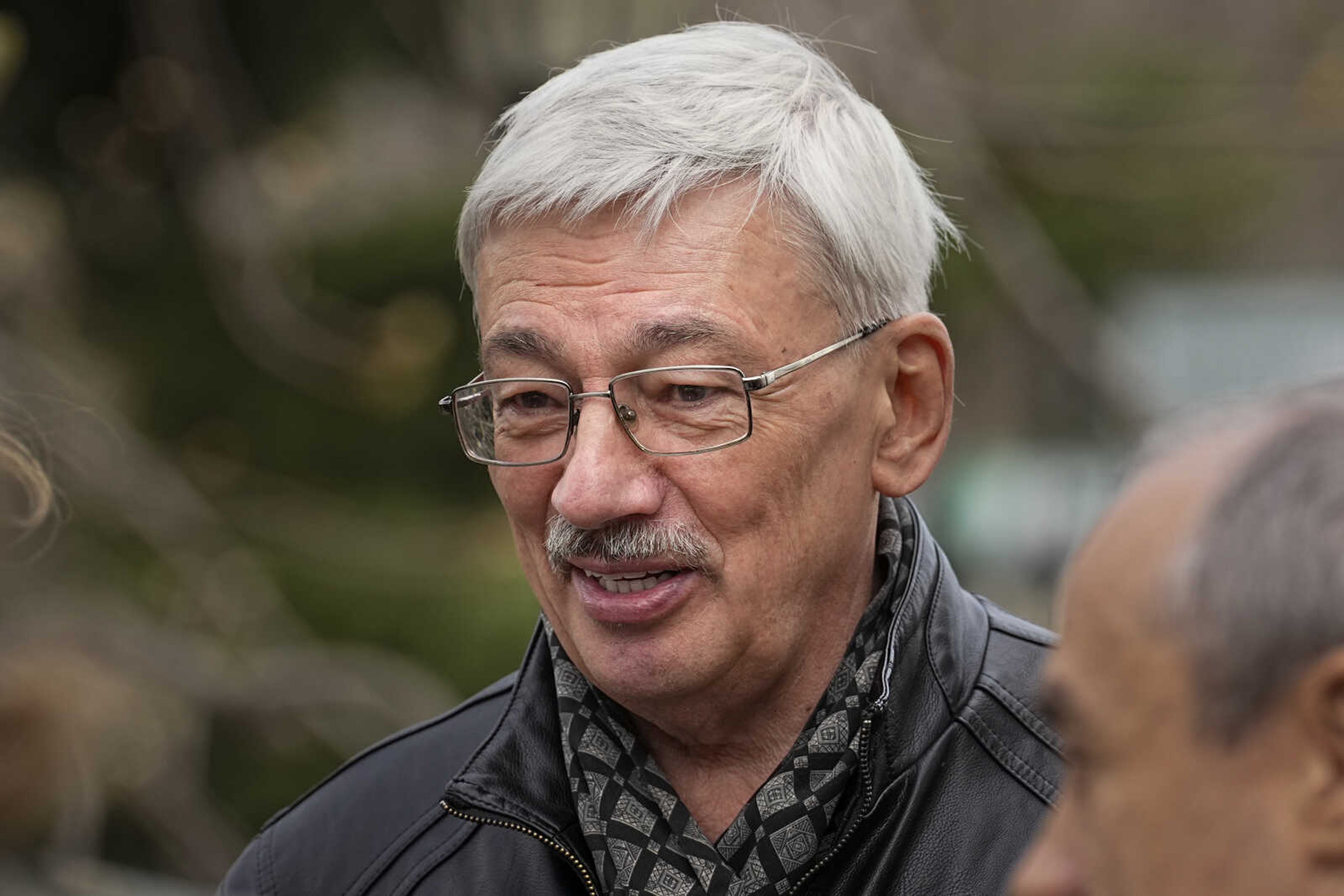 Oleg Orlov, a member of the Board of the International Historical Educational Charitable and Human Rights Society  Memorial  (International Memorial), speaks to journalists after the sentence of Russian opposition activist Vladimir Kara-Murza at the Moscow City Court in Moscow, Russia, on Monday, April 17, 2023. A top Kremlin foe was convicted Monday on charges of treason and denigrating the Russian military and sentenced him to 25 years in prison after a trial that marked the latest move in a relentless crackdown on the opposition amid the fighting in Ukraine. (AP Photo/Alexander Zemlianichenko)